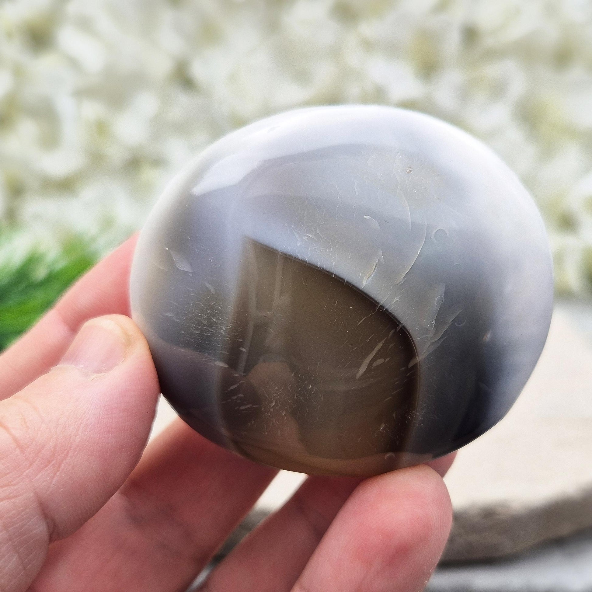 Orca Agate pebble from Madagascar. A rare crystal for emotional healing, forgiveness, inner strength, and support through life’s challenges.