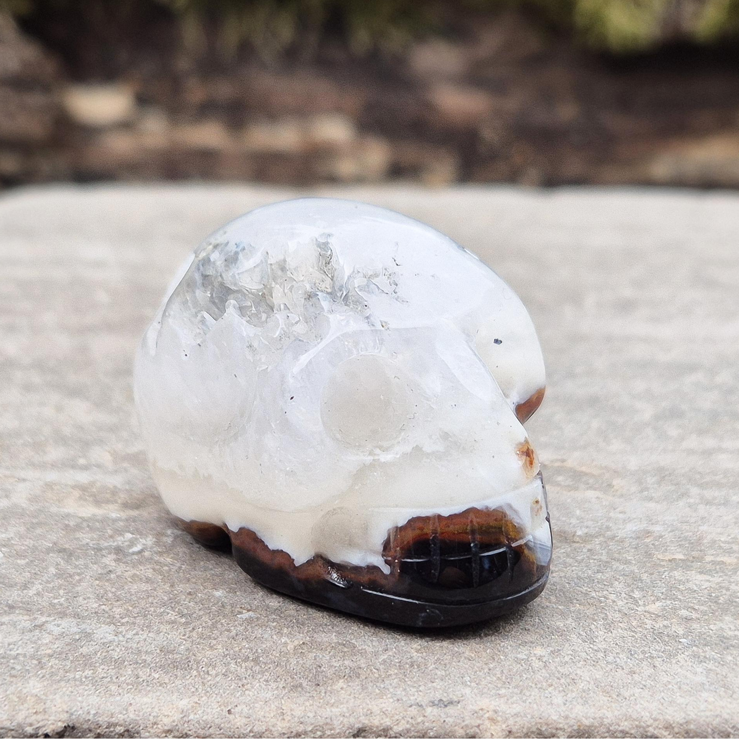 Sardonyx Crystal Skull for strength, protection, and clarity. Supports willpower, honest action, and spiritual stability. Great for home decor or altar work.