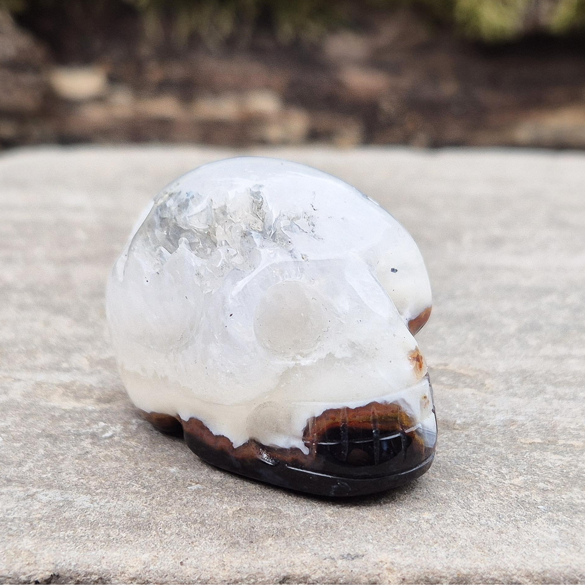 Sardonyx Crystal Skull for strength, protection, and clarity. Supports willpower, honest action, and spiritual stability. Great for home decor or altar work.