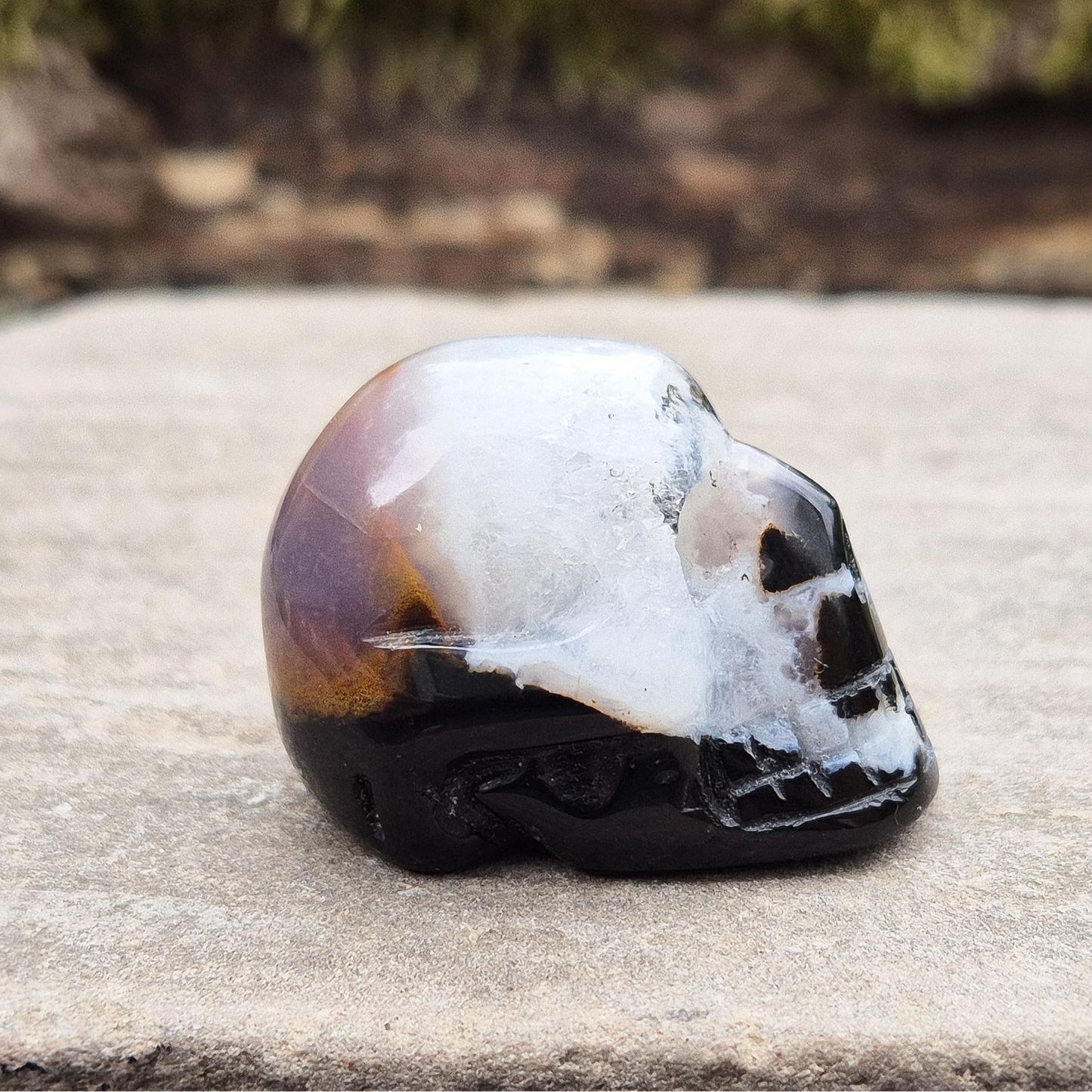 Polished Sardonyx and Jasper Skull from Brazil for wisdom, clarity, and protection. Connects you to ancestral strength and inner guidance. 