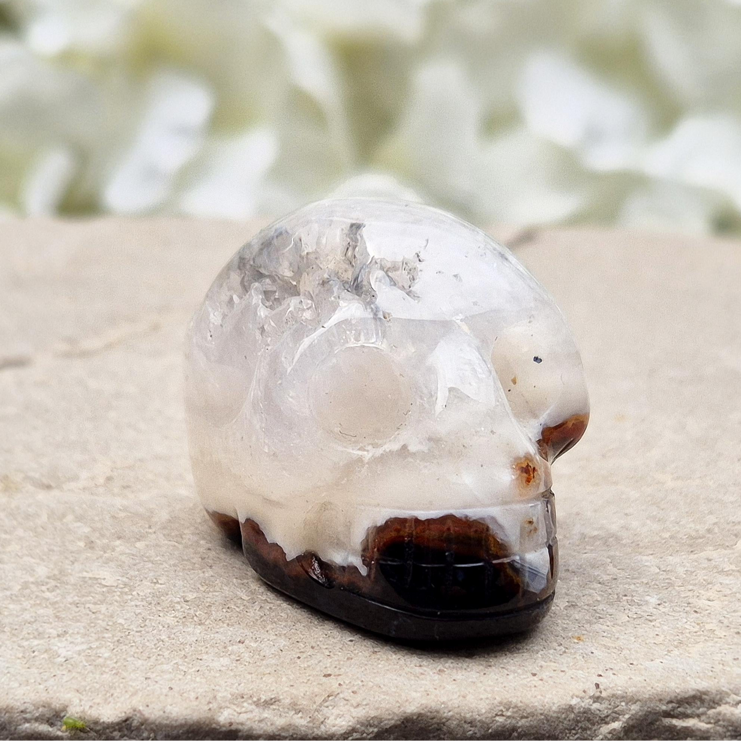Sardonyx Crystal Skull for strength, protection, and clarity. Supports willpower, honest action, and spiritual stability. Great for home decor or altar work.