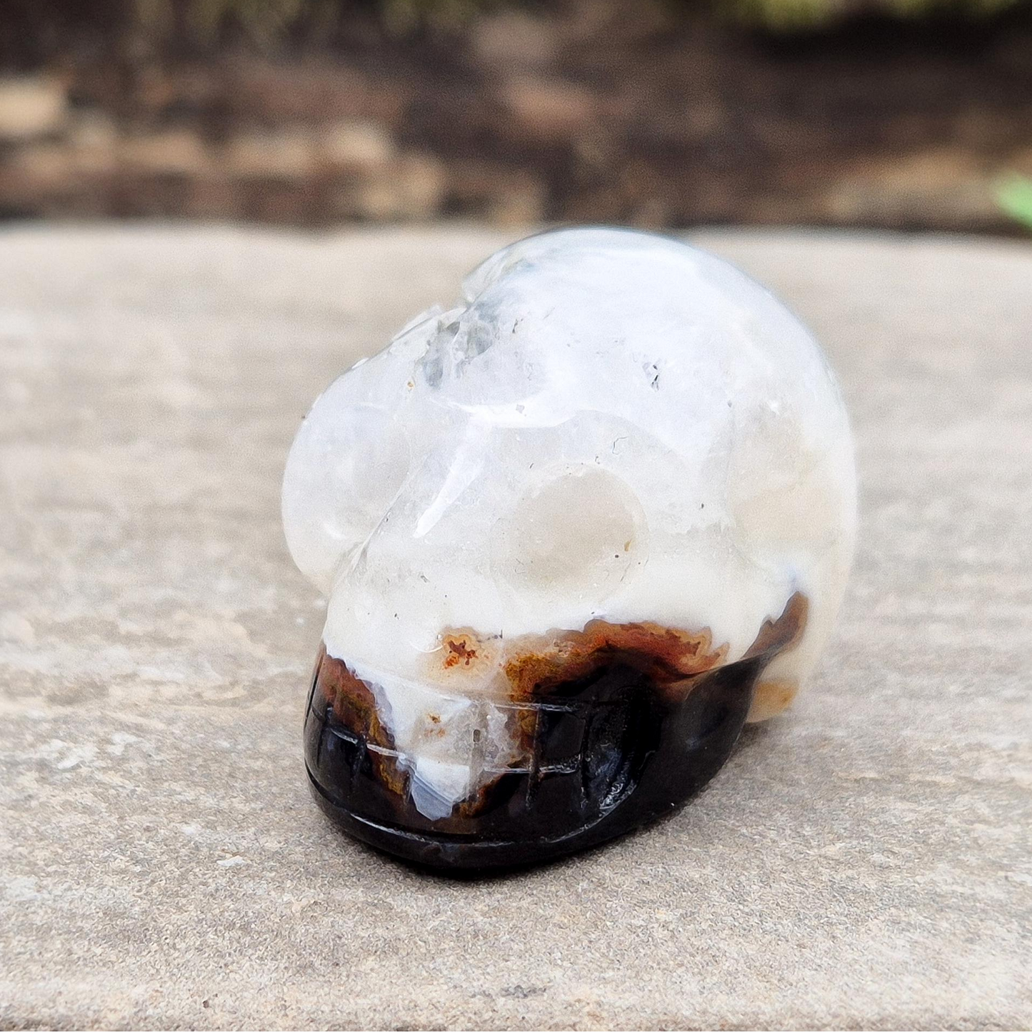 Sardonyx Crystal Skull for strength, protection, and clarity. Supports willpower, honest action, and spiritual stability. Great for home decor or altar work.