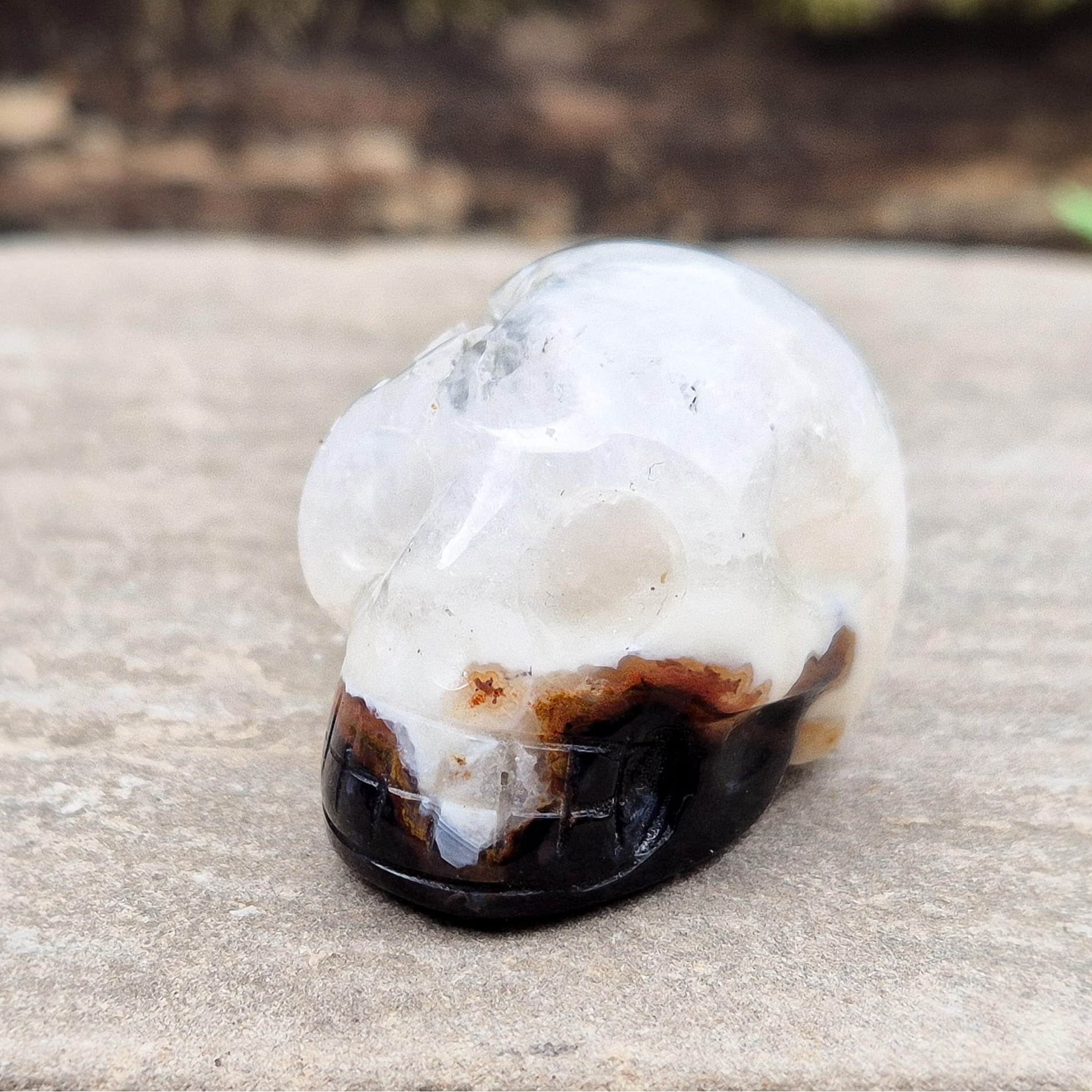 Sardonyx Crystal Skull for strength, protection, and clarity. Supports willpower, honest action, and spiritual stability. Great for home decor or altar work.