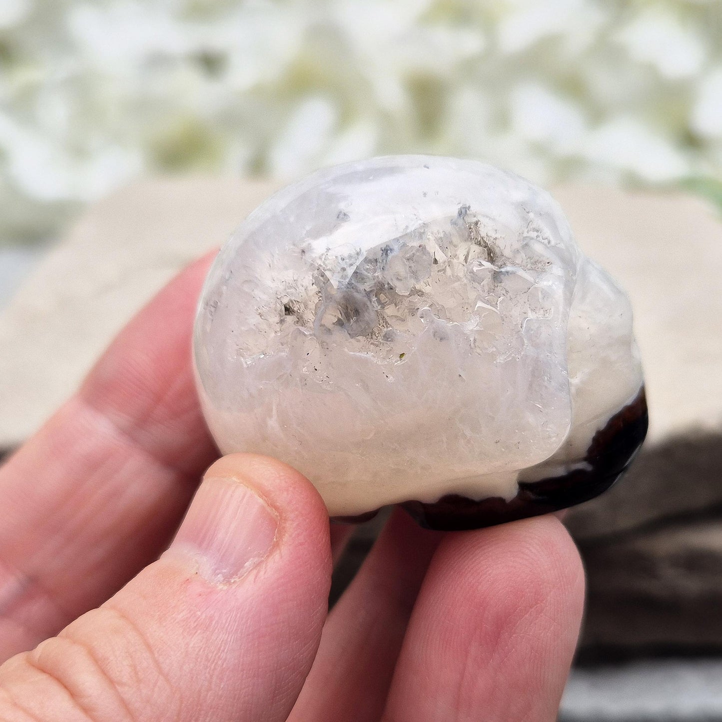 Sardonyx Crystal Skull for strength, protection, and clarity. Supports willpower, honest action, and spiritual stability. Great for home decor or altar work.