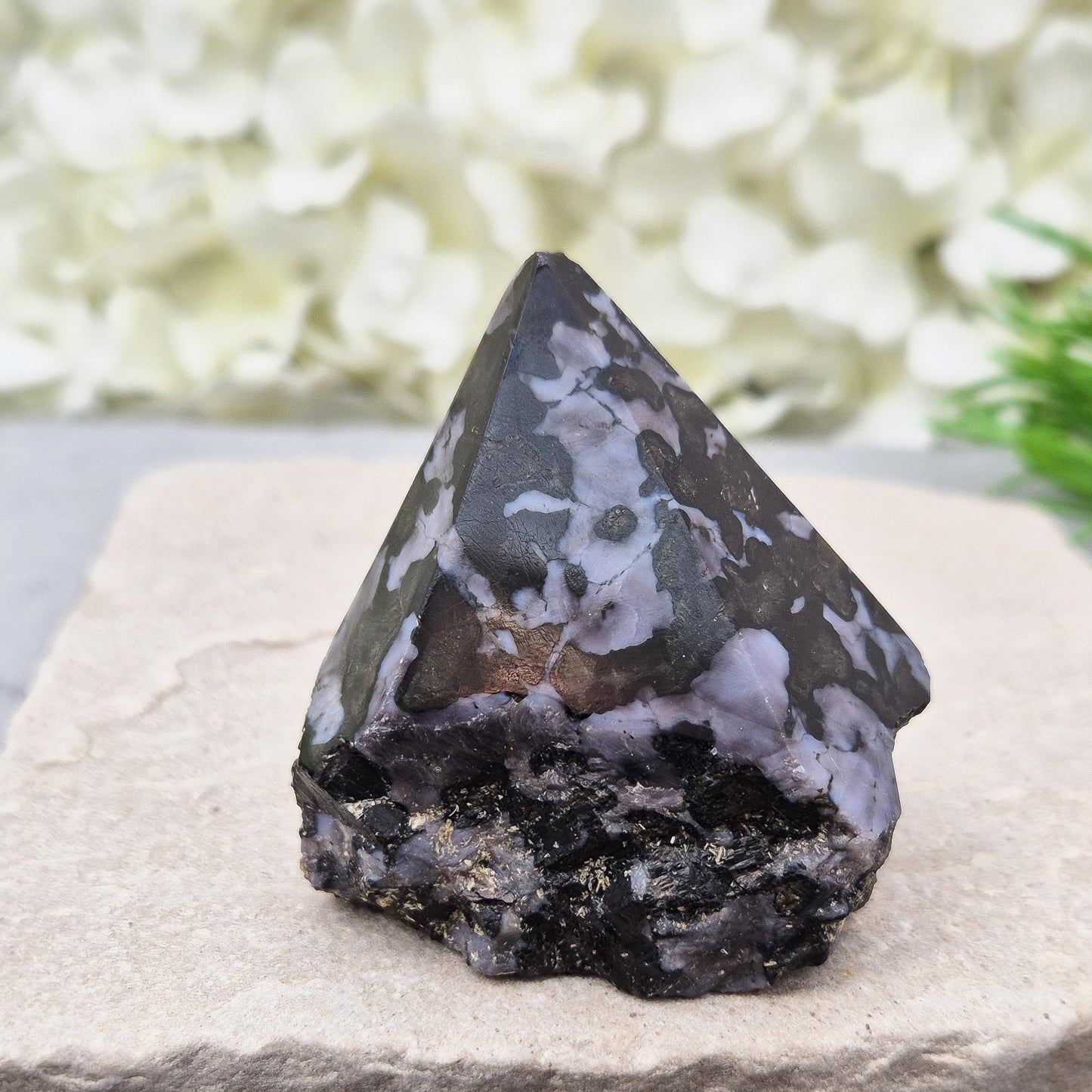 Indigo Gabbro (mystic merlinite) crystal point with deep insight energy. Grounded guidance for shadow work, clarity, and intuitive awakening. 