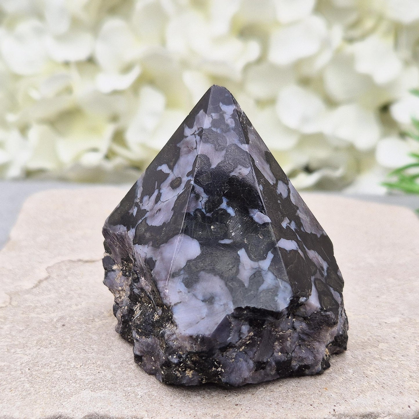 Indigo Gabbro (mystic merlinite) crystal point with deep insight energy. Grounded guidance for shadow work, clarity, and intuitive awakening. 