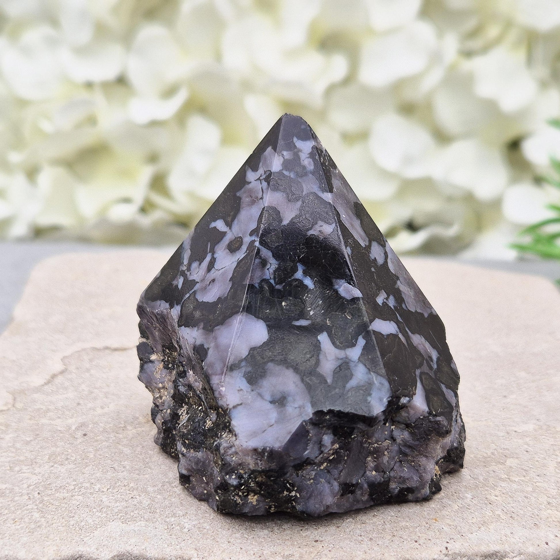 Indigo Gabbro (mystic merlinite) crystal point with deep insight energy. Grounded guidance for shadow work, clarity, and intuitive awakening. 