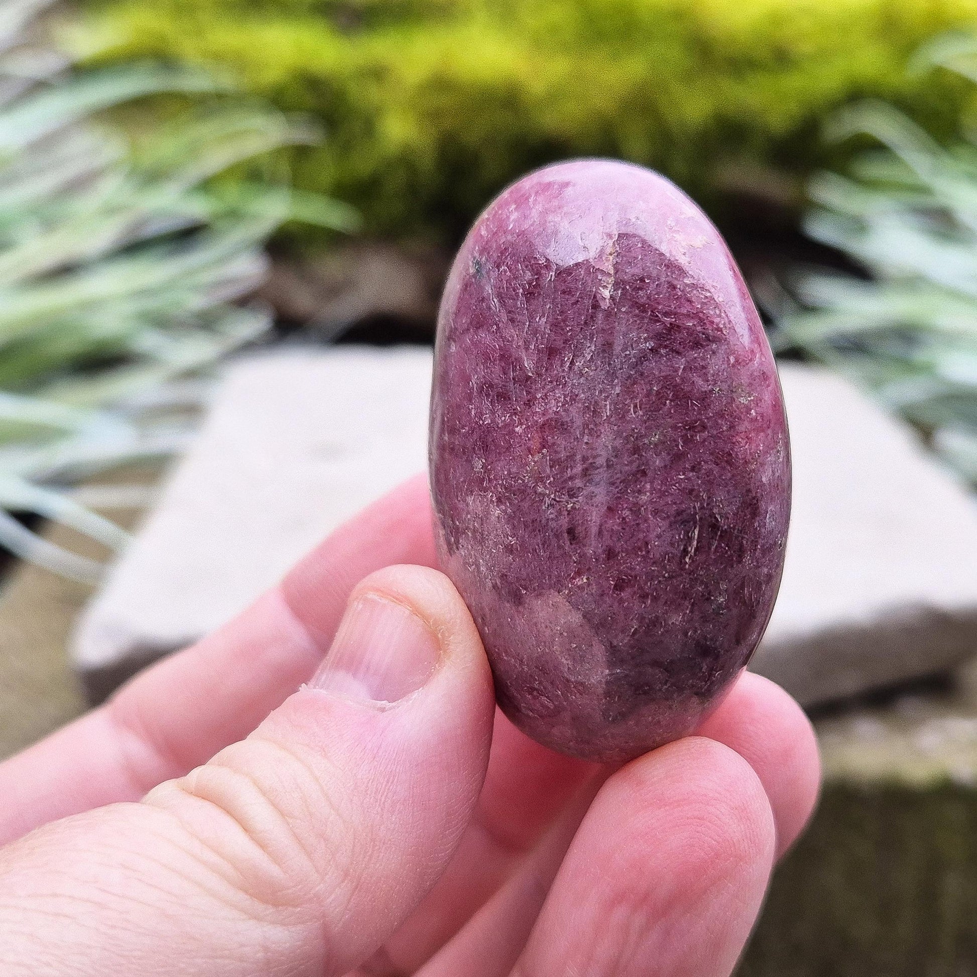 Rhodonite: A stunning gemstone that promotes emotional balance, love, and self-awareness, making it a perfect addition to any crystal collection.