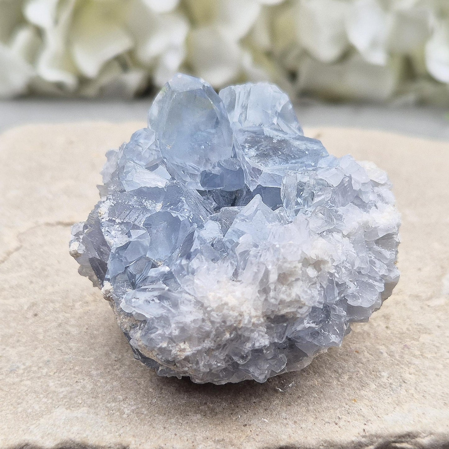 Sparkling Celestite cluster from Madagascar. A calming, uplifting crystal for peace, creativity, spiritual connection, and angelic guidance.