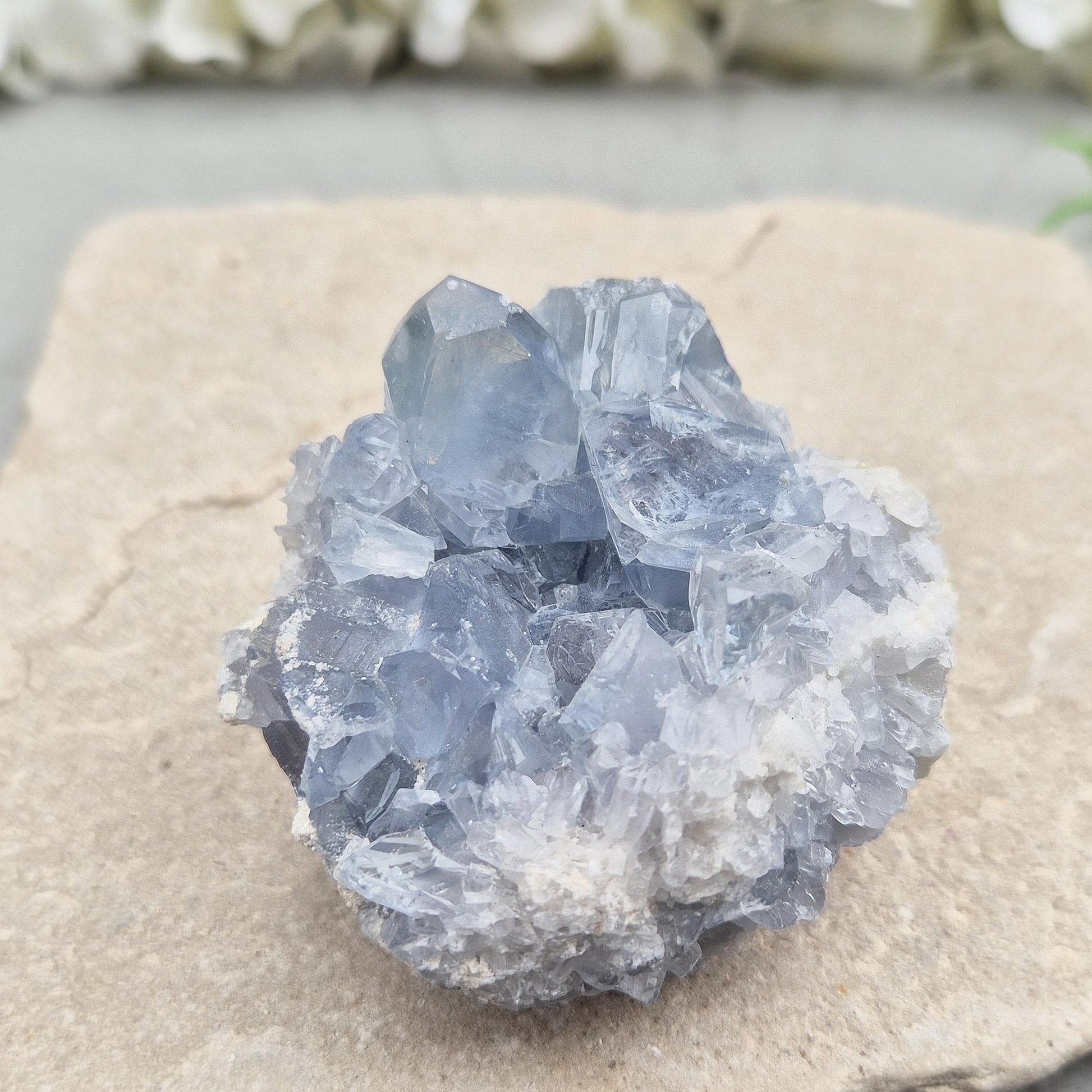 Sparkling Celestite cluster from Madagascar. A calming, uplifting crystal for peace, creativity, spiritual connection, and angelic guidance.