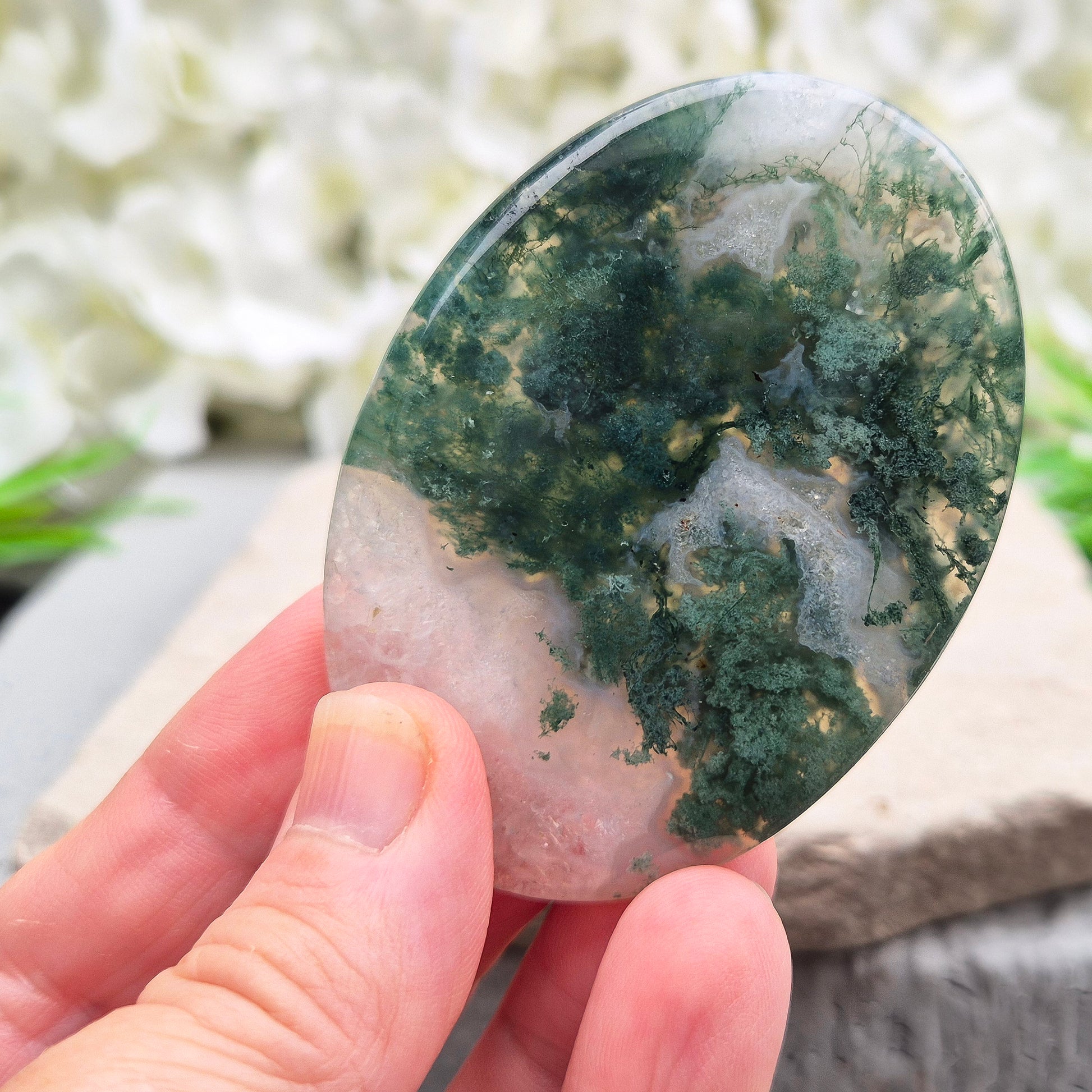 Polished Moss Agate palm stone. Known as a stone of nature, grounding and growth, it supports balance, stability and a calm, centred mind.