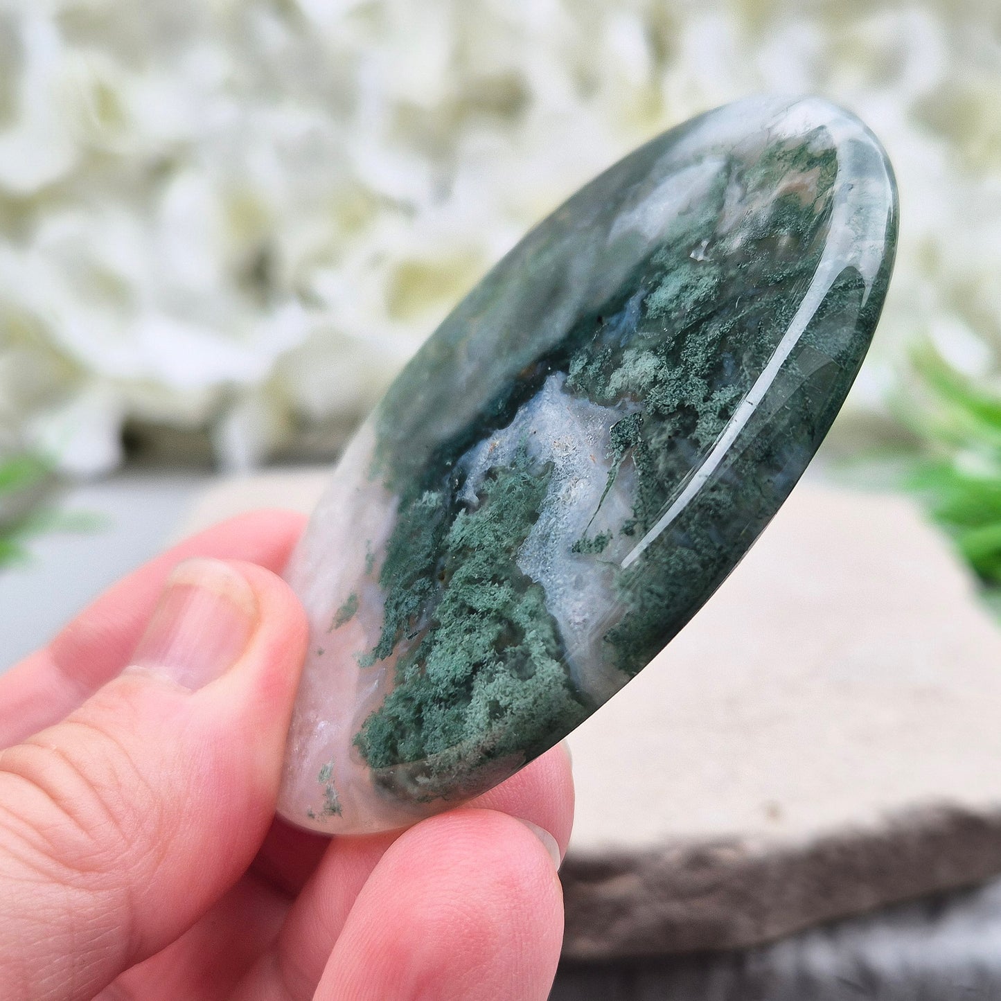 Polished Moss Agate palm stone. Known as a stone of nature, grounding and growth, it supports balance, stability and a calm, centred mind.