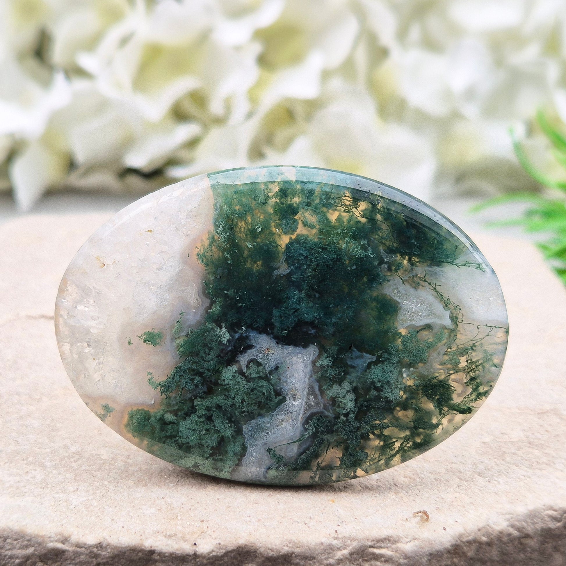 Polished Moss Agate palm stone. Known as a stone of nature, grounding and growth, it supports balance, stability and a calm, centred mind.