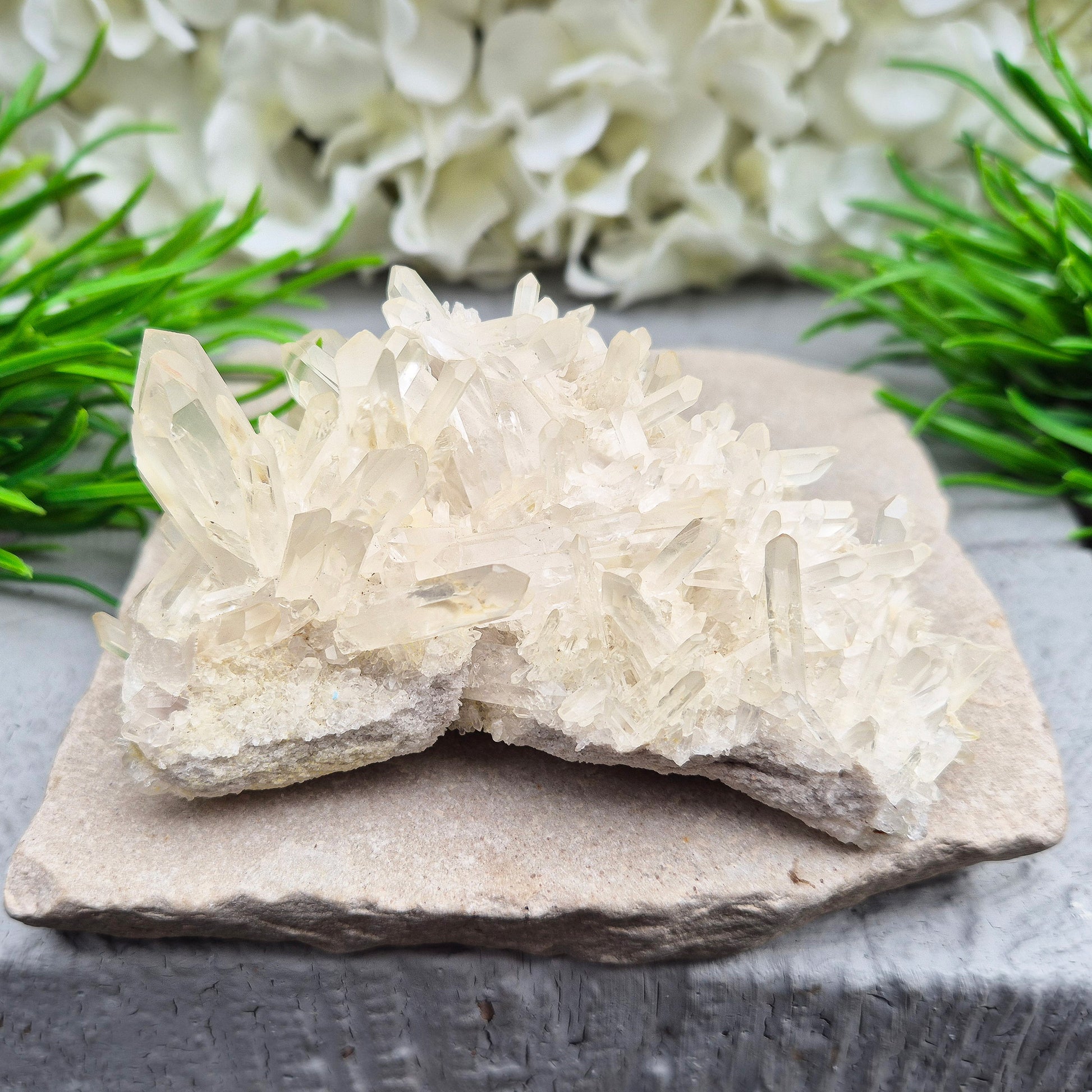 Clear Quartz Cluster – a master healer that amplifies energy, restores balance, and enhances focus, clarity, and spiritual growth.