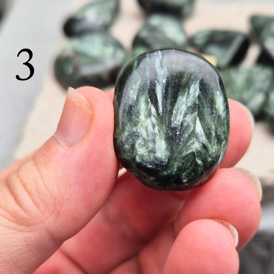 Seraphinite crystal for grounding, heart healing, and gentle spiritual growth. Handpicked pieces with rich green coloring for everyday energy work. 