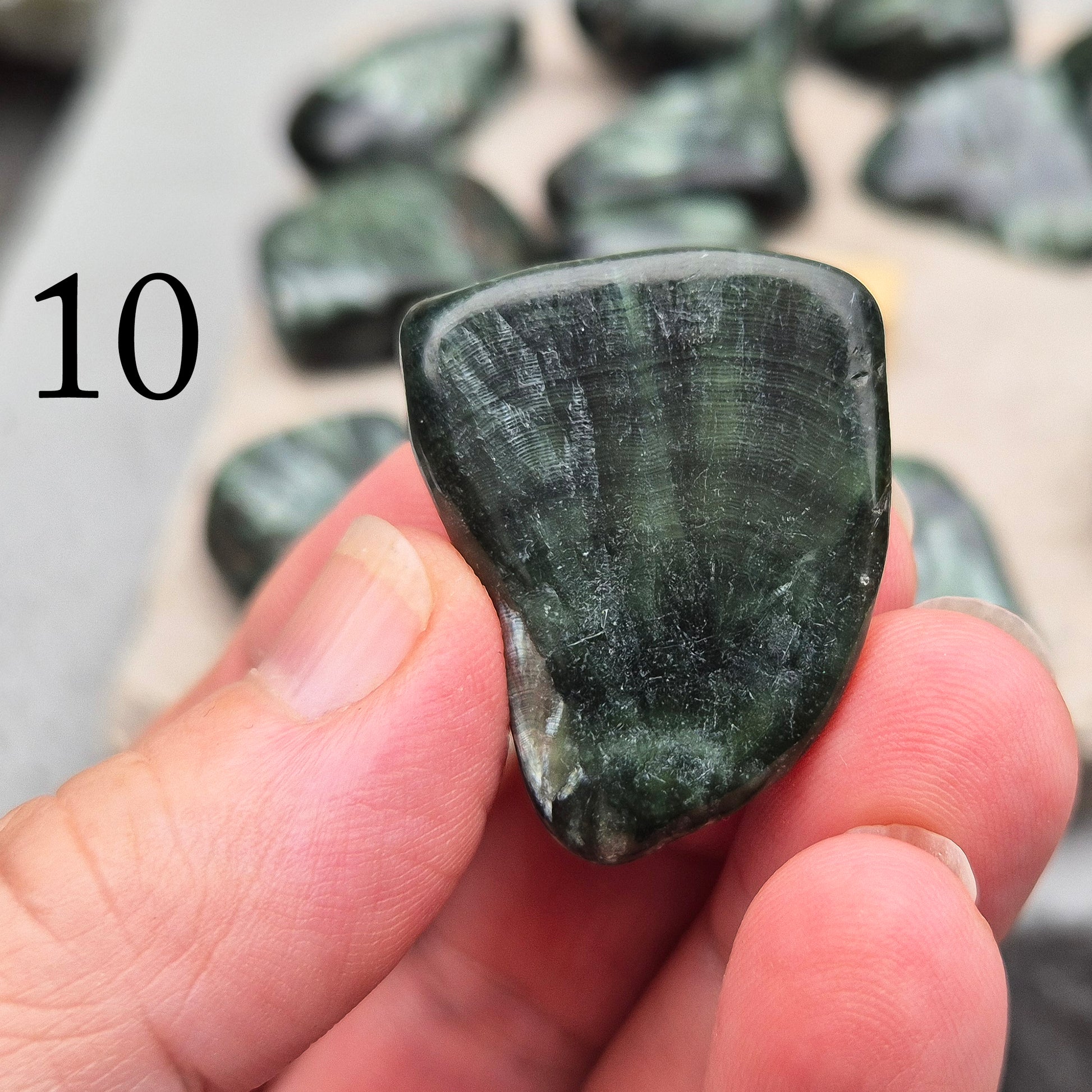 Seraphinite crystal for grounding, heart healing, and gentle spiritual growth. Handpicked pieces with rich green coloring for everyday energy work.