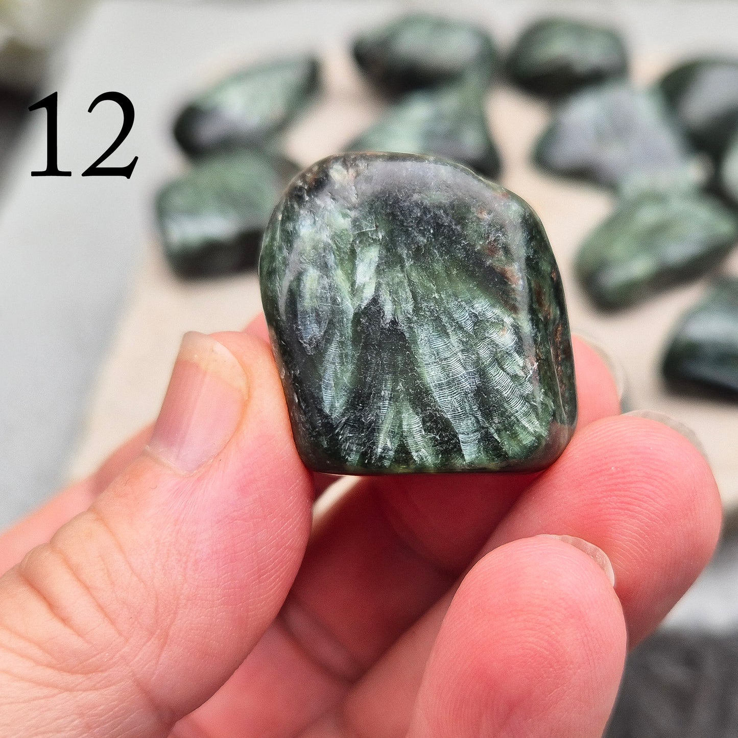 Seraphinite crystal for grounding, heart healing, and gentle spiritual growth. Handpicked pieces with rich green coloring for everyday energy work.