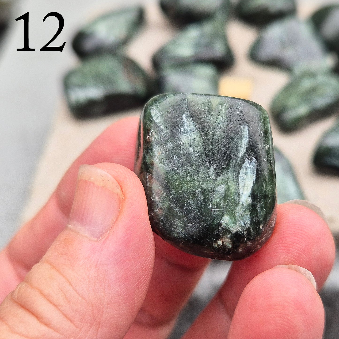 Seraphinite crystal for grounding, heart healing, and gentle spiritual growth. Handpicked pieces with rich green coloring for everyday energy work.