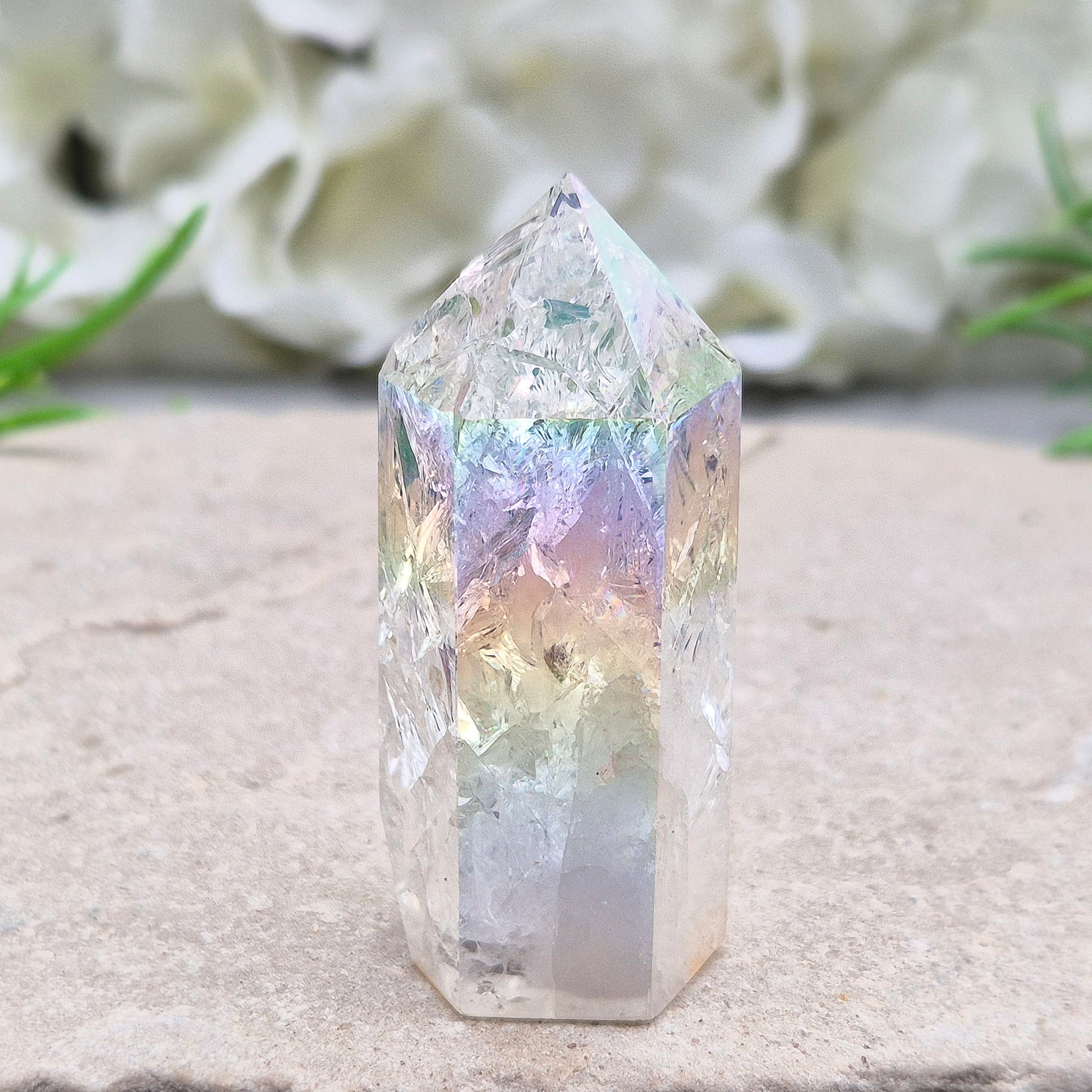 Aura Fire and Ice Quartz combines rainbow shimmer with powerful cleansing energy, balancing emotion, clarity, and spiritual light.