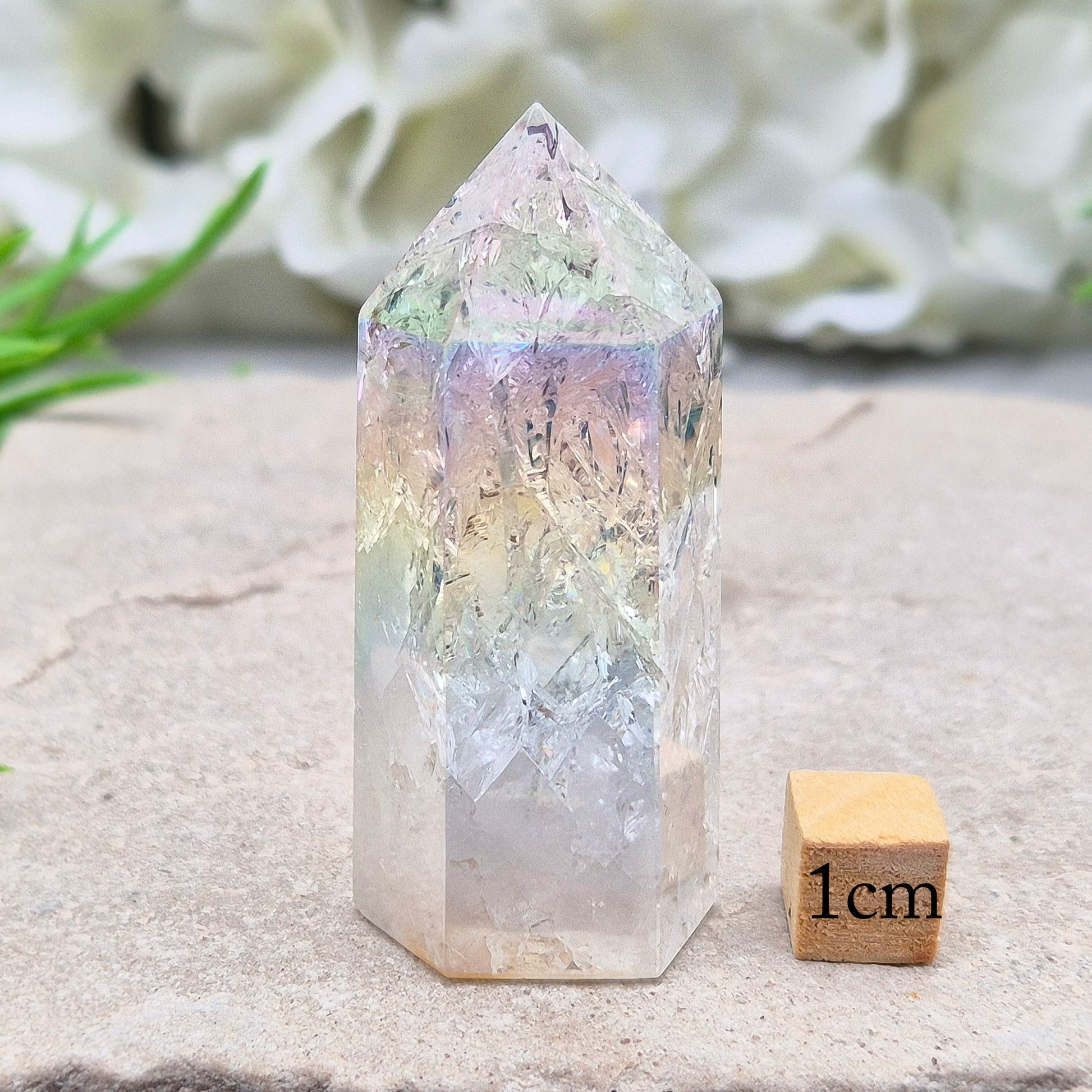 Aura Fire and Ice Quartz combines rainbow shimmer with powerful cleansing energy, balancing emotion, clarity, and spiritual light.