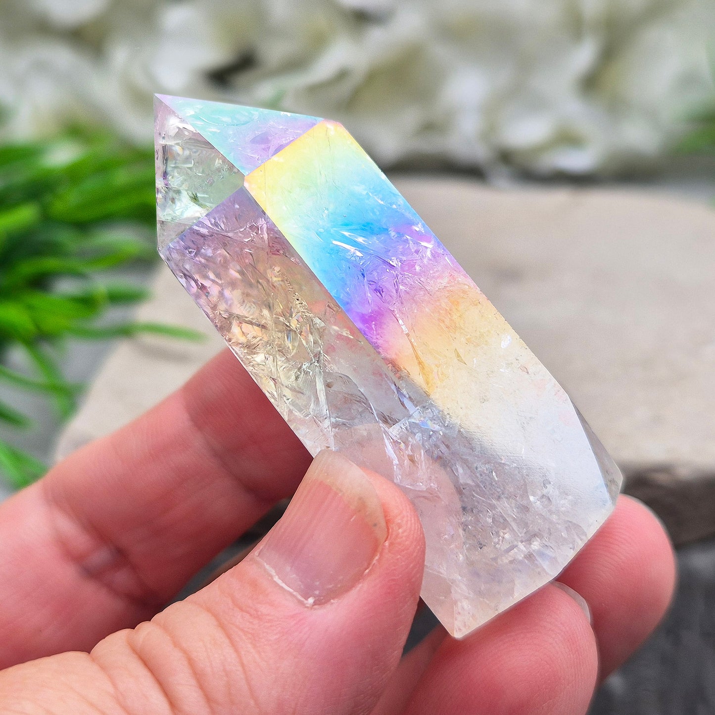 Aura Fire and Ice Quartz combines rainbow shimmer with powerful cleansing energy, balancing emotion, clarity, and spiritual light.