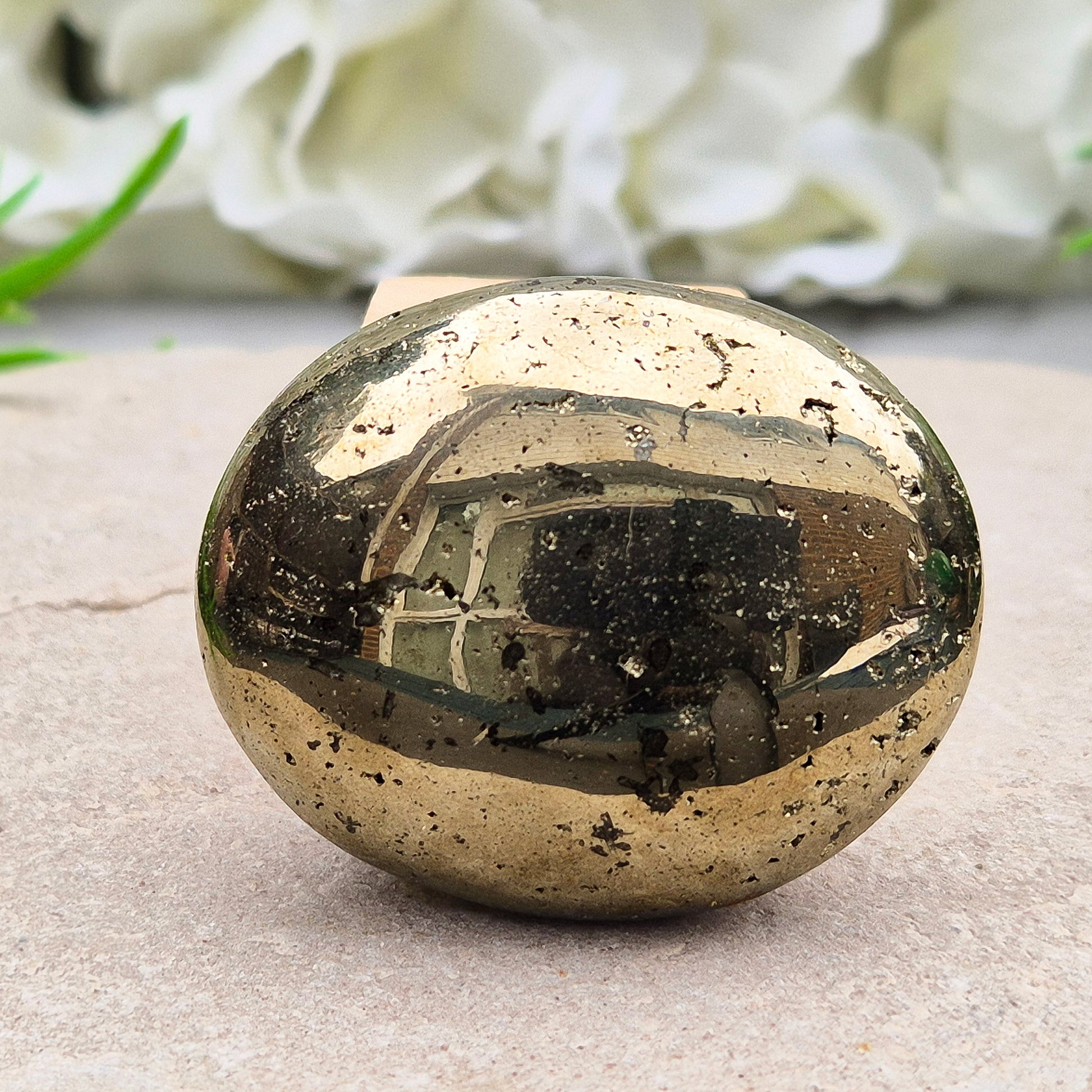 Sparkling Pyrite palmstone from Brazil. A crystal of protection, confidence, and focus—ideal for creativity, insight, and shielding from negativity.