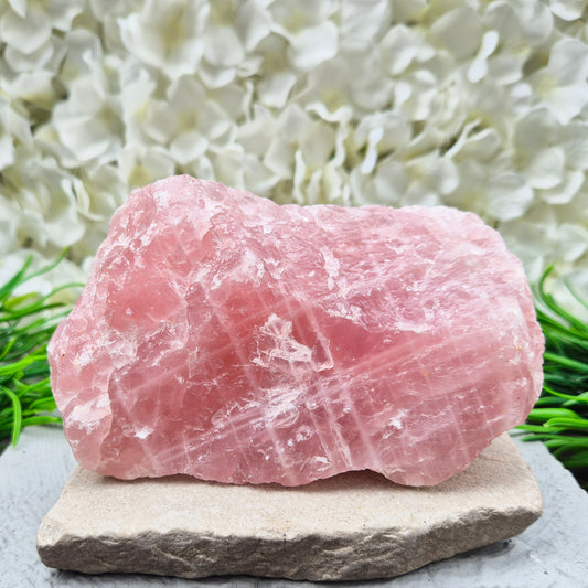 Natural Rose Quartz crystal to display in your home. Promotes calm, self-love, and emotional balance while bringing harmony to your space.