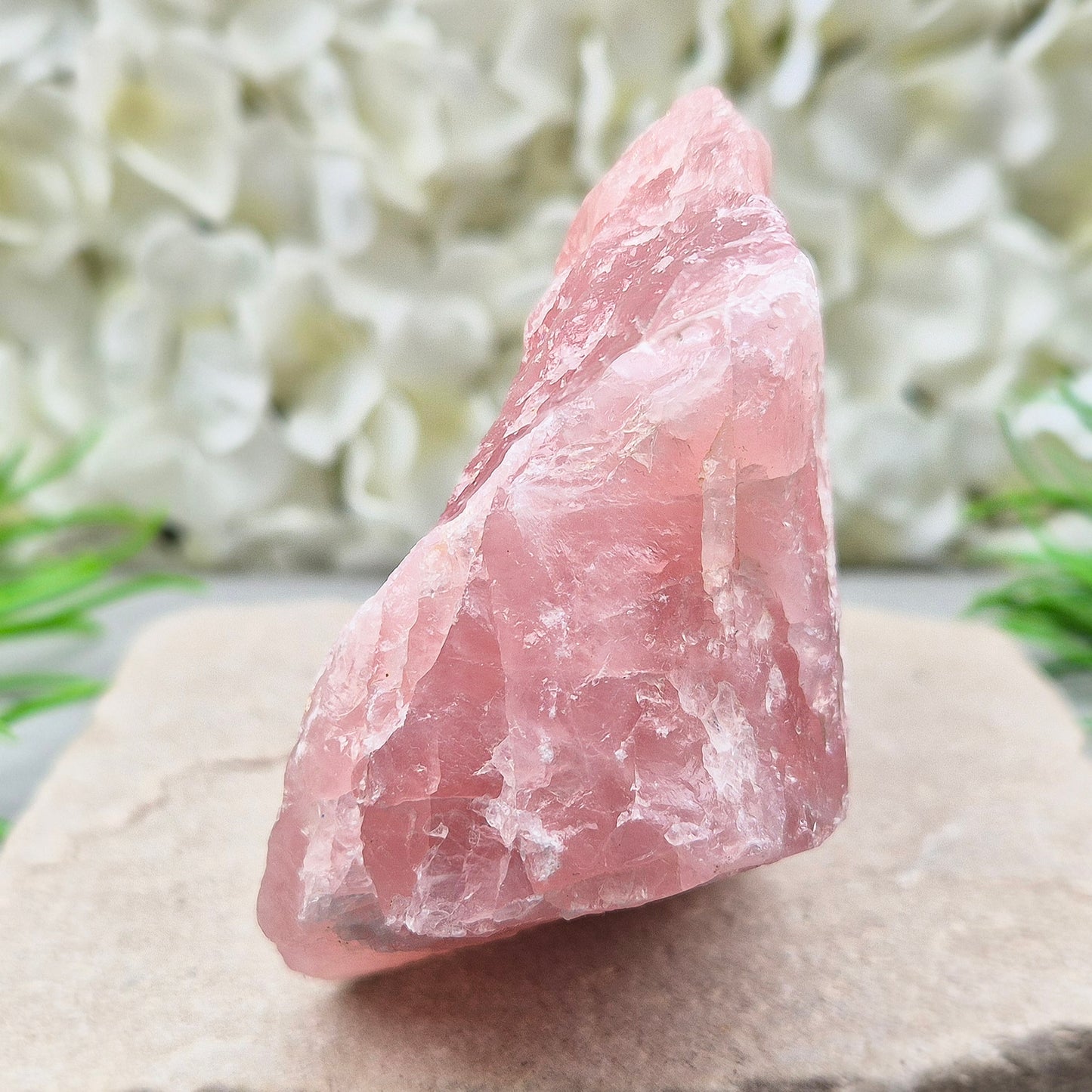 Natural Rose Quartz crystal to display in your home. Promotes calm, self-love, and emotional balance while bringing harmony to your space.