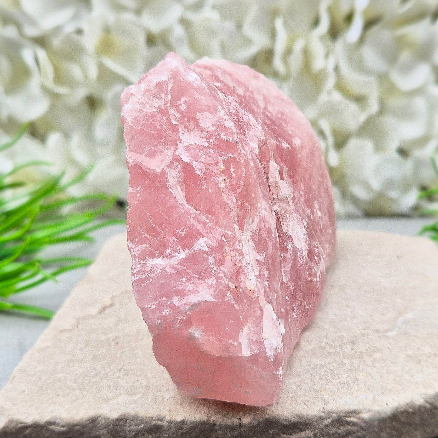 Natural Rose Quartz crystal to display in your home. Promotes calm, self-love, and emotional balance while bringing harmony to your space.