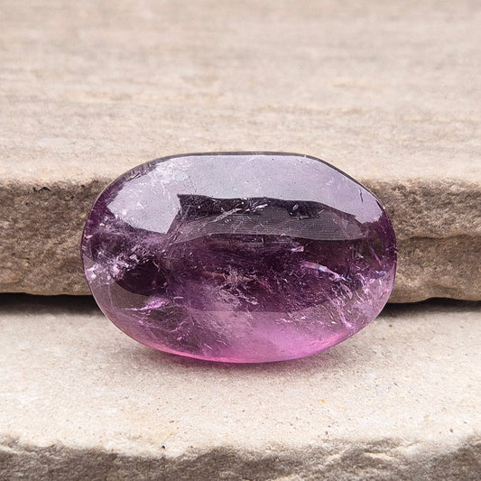 Amethyst Palm Stone with deep purple tones. A soothing crystal for balance, peaceful energy, and gentle spiritual connection. 