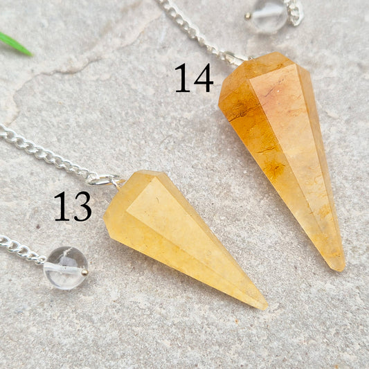Golden Healer Quartz pendulum for energy work, dowsing, and intuitive guidance. Connects to gentle healing, balance, and spiritual growth.