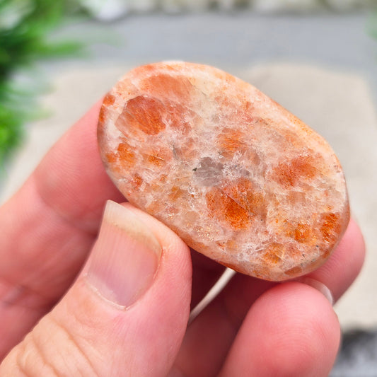 Sunstone Palm Stone – crystal of joy, vitality and confidence. Smooth and polished for meditation, energy work, or carrying uplifting energy with you.