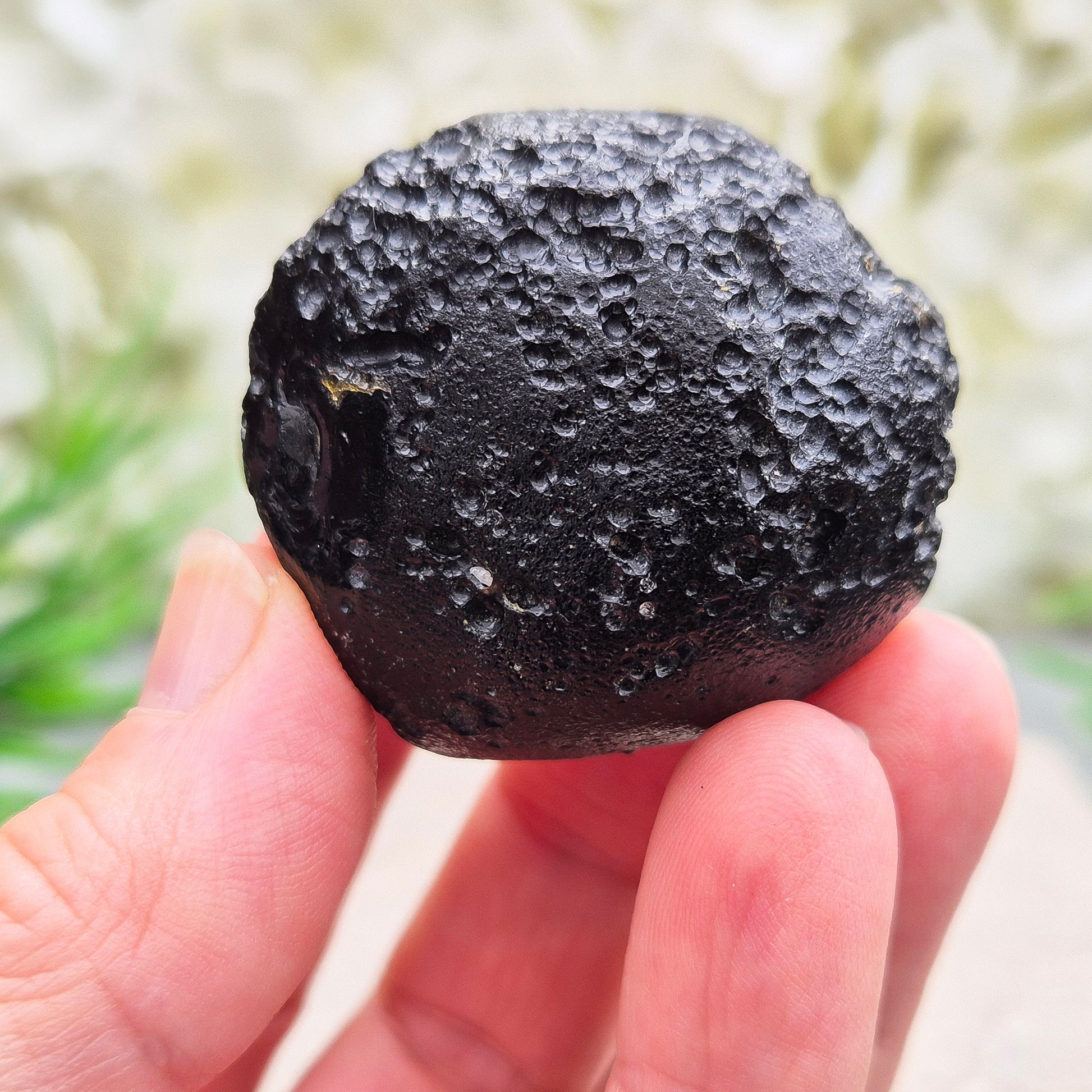 Natural Black Tektite to strengthen grounding, release blockages, and support personal growth. Ideal for energy work and transformation.