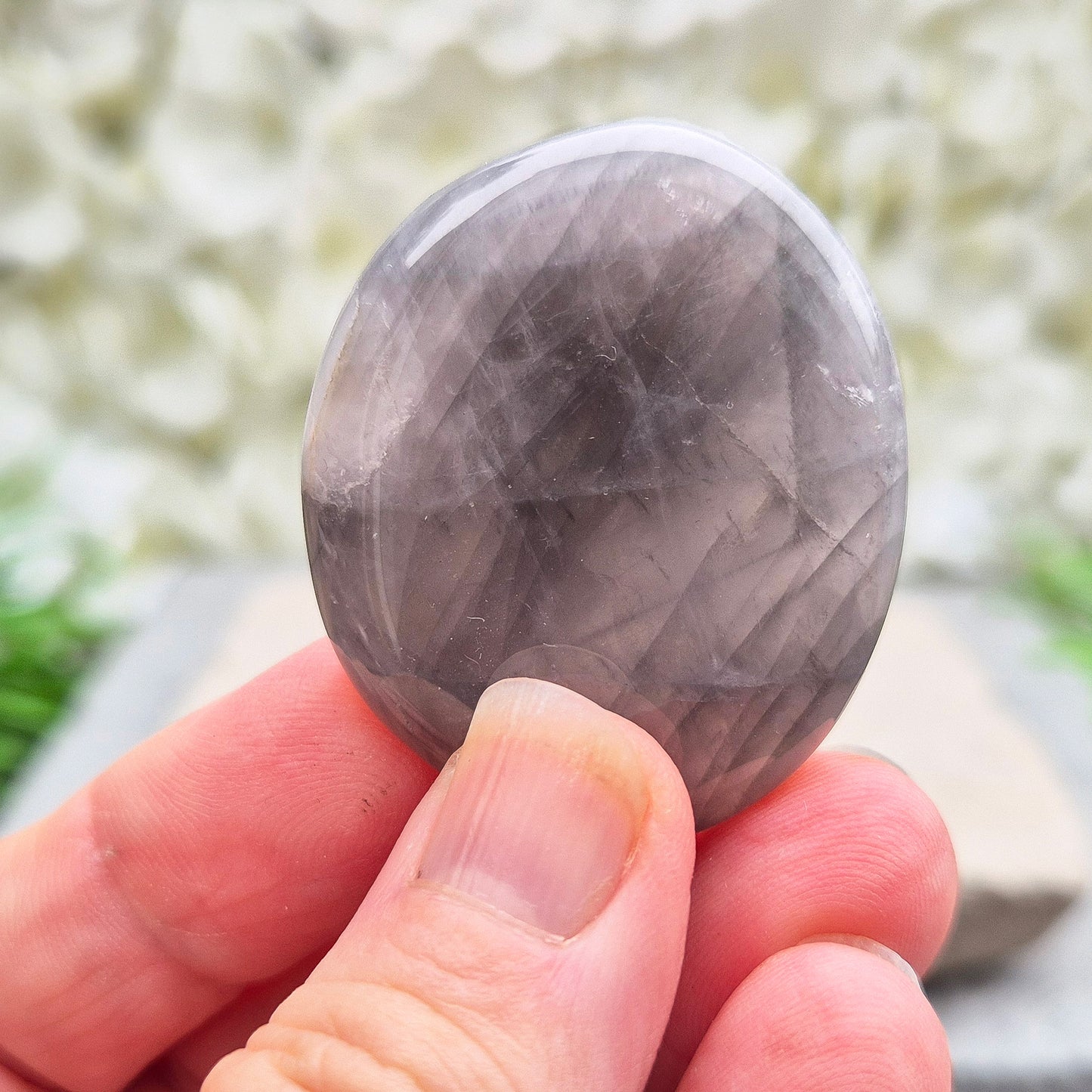 Shop Lunar Quartz palm stones. Boost confidence, ease emotions, and feel more connected to your inner guidance with this soothing crystal.