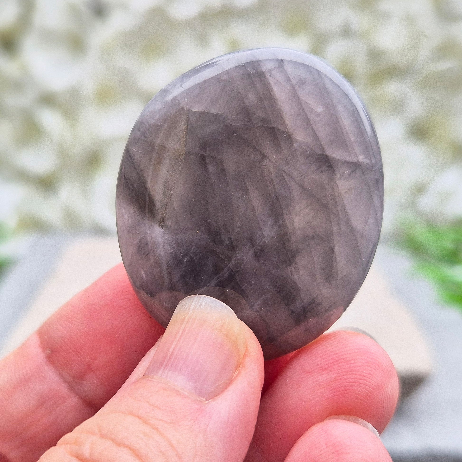 Shop Lunar Quartz palm stones. Boost confidence, ease emotions, and feel more connected to your inner guidance with this soothing crystal.