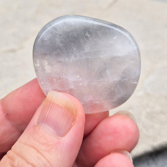 Lunar Quartz palm stones for peace, creativity, and spiritual connection. Handpicked crystals to support calm energy and open communication.