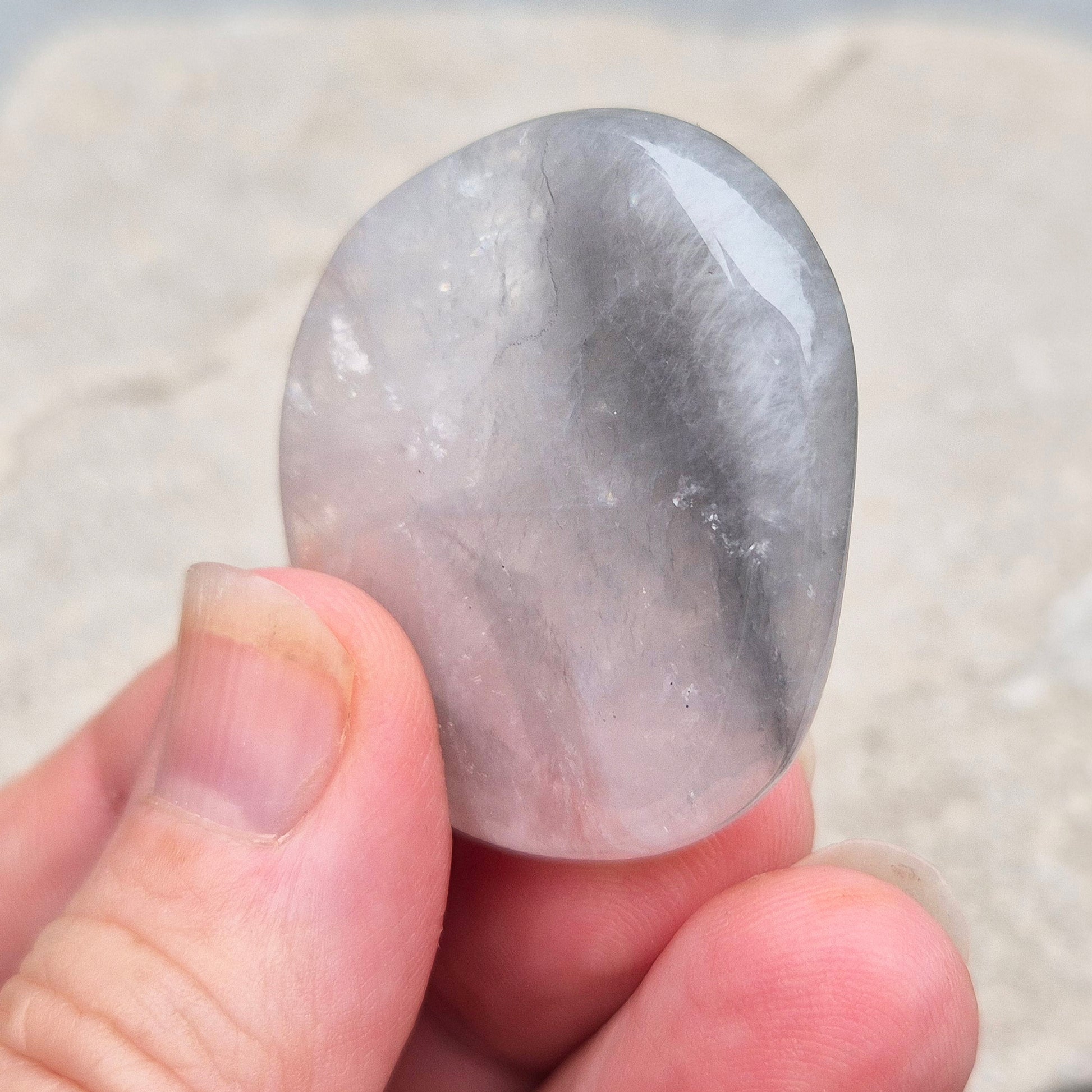 Lunar Quartz palm stones for peace, creativity, and spiritual connection. Handpicked crystals to support calm energy and open communication.