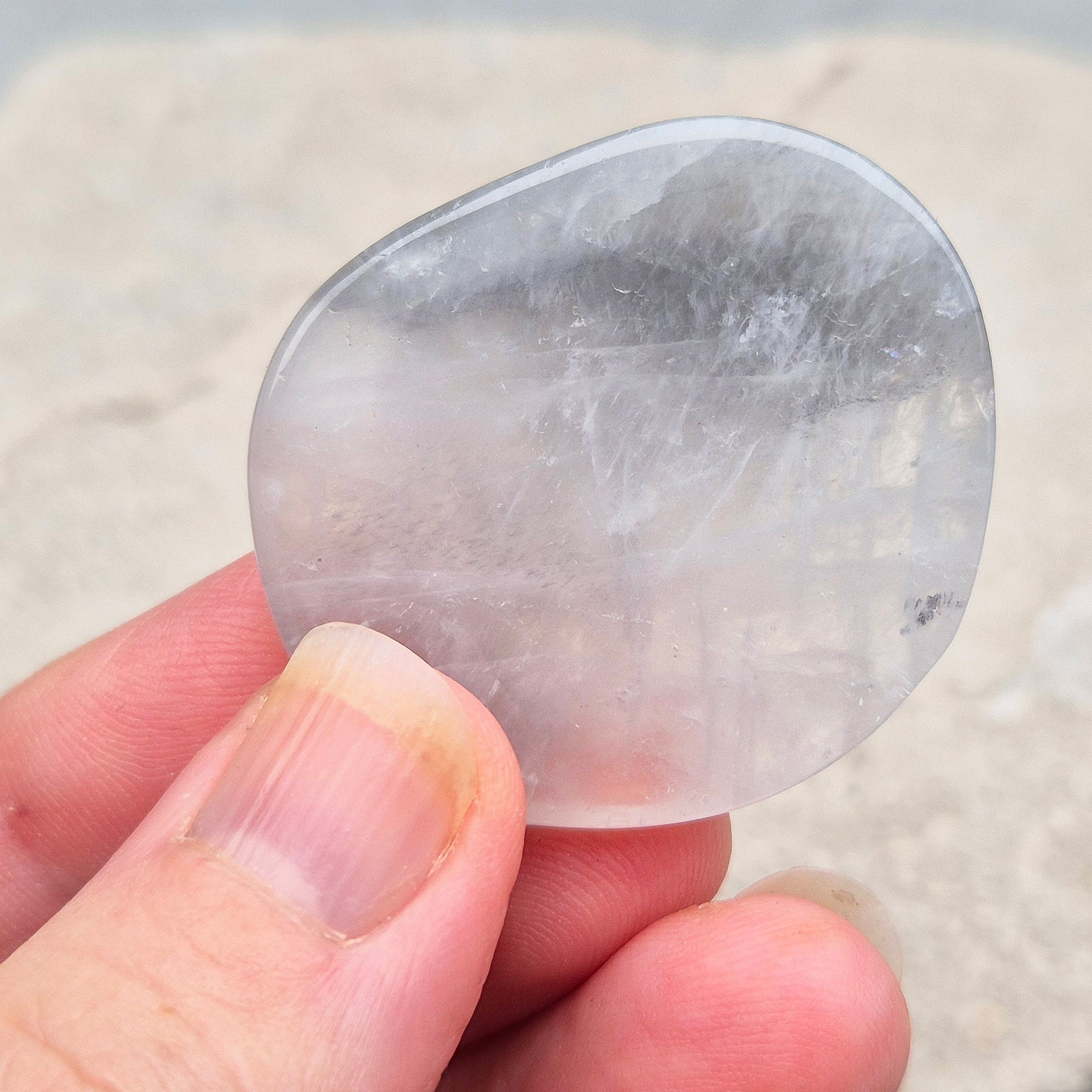 Lunar Quartz palm stones for peace, creativity, and spiritual connection. Handpicked crystals to support calm energy and open communication.