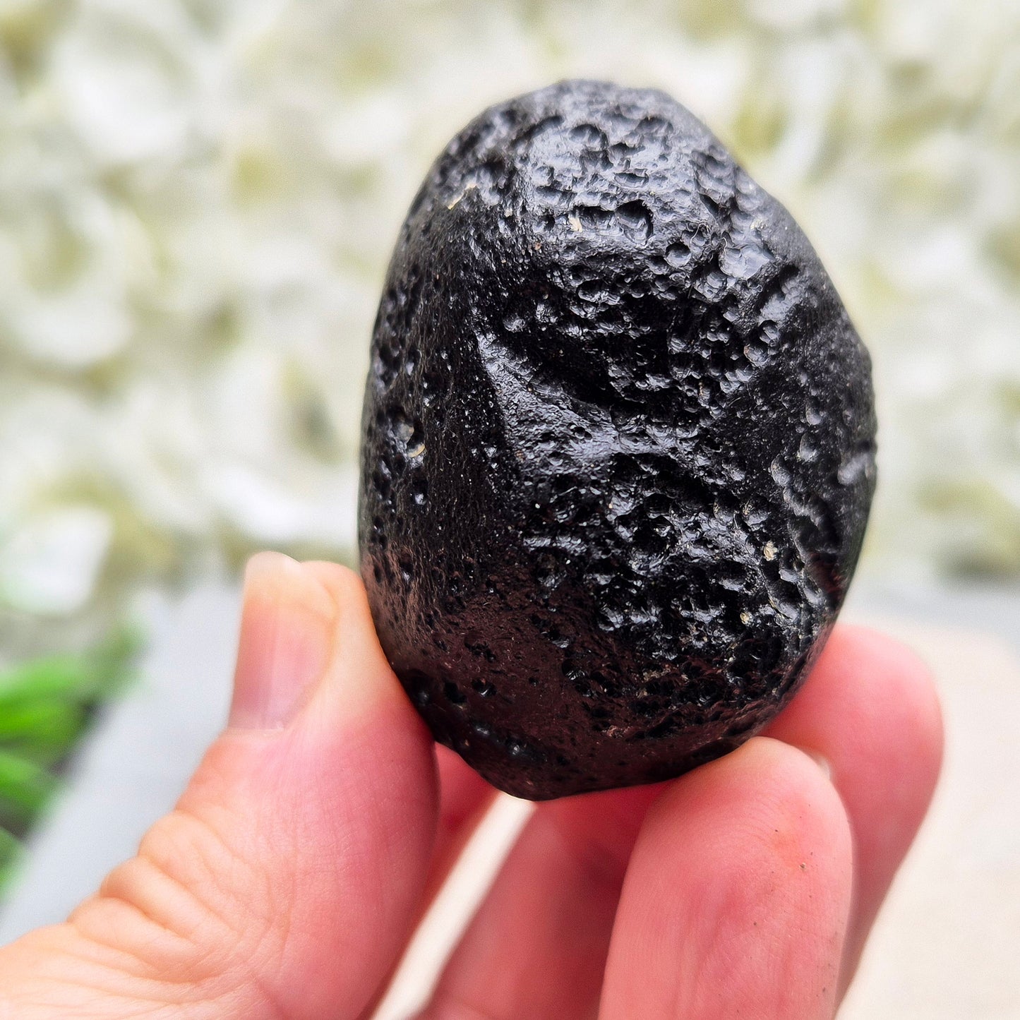 Genuine Black Tektite for grounding and energetic protection. Formed from ancient meteorite impacts. Ideal for meditation and aura clearing.