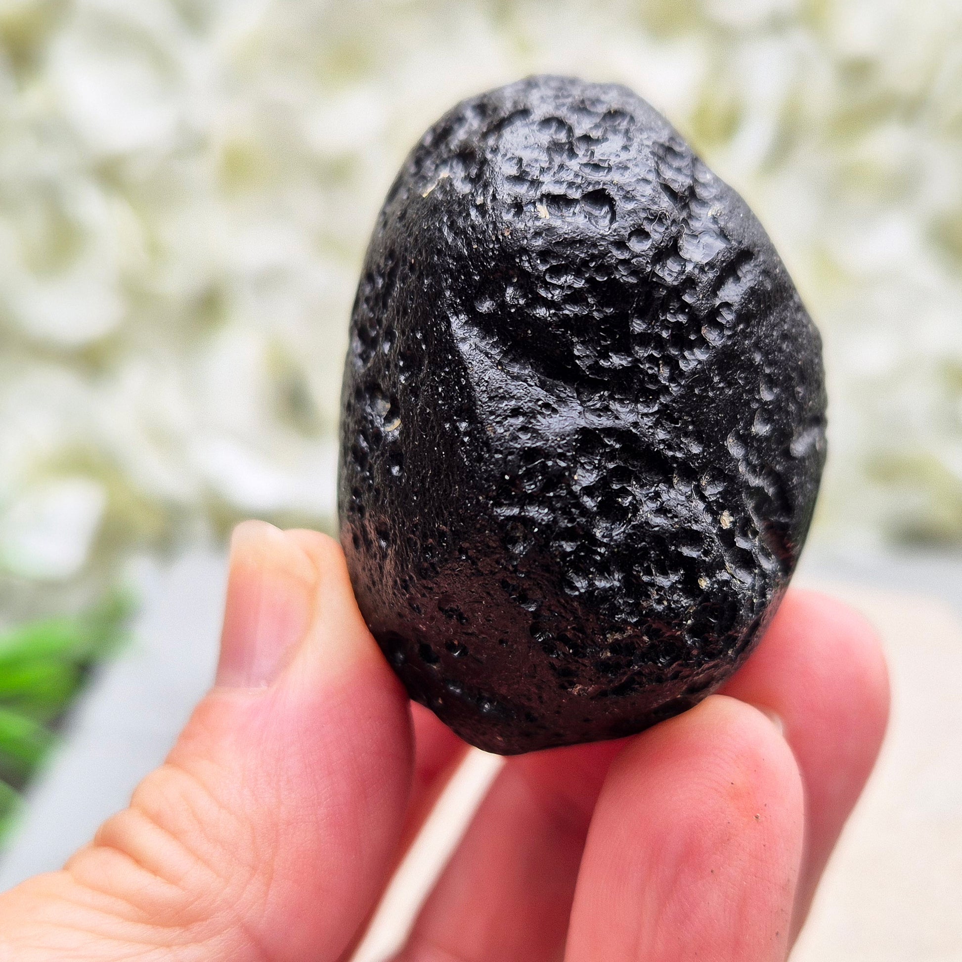 Genuine Black Tektite for grounding and energetic protection. Formed from ancient meteorite impacts. Ideal for meditation and aura clearing.