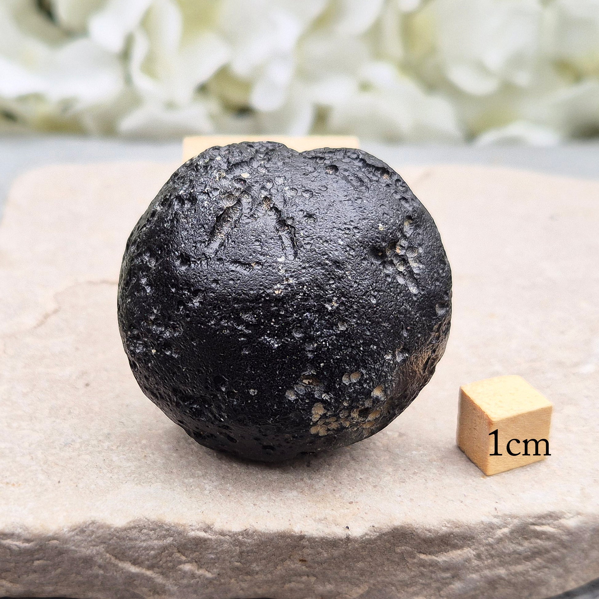 Genuine Black Tektite for grounding and energetic protection. Formed from ancient meteorite impacts. Ideal for meditation and aura clearing.