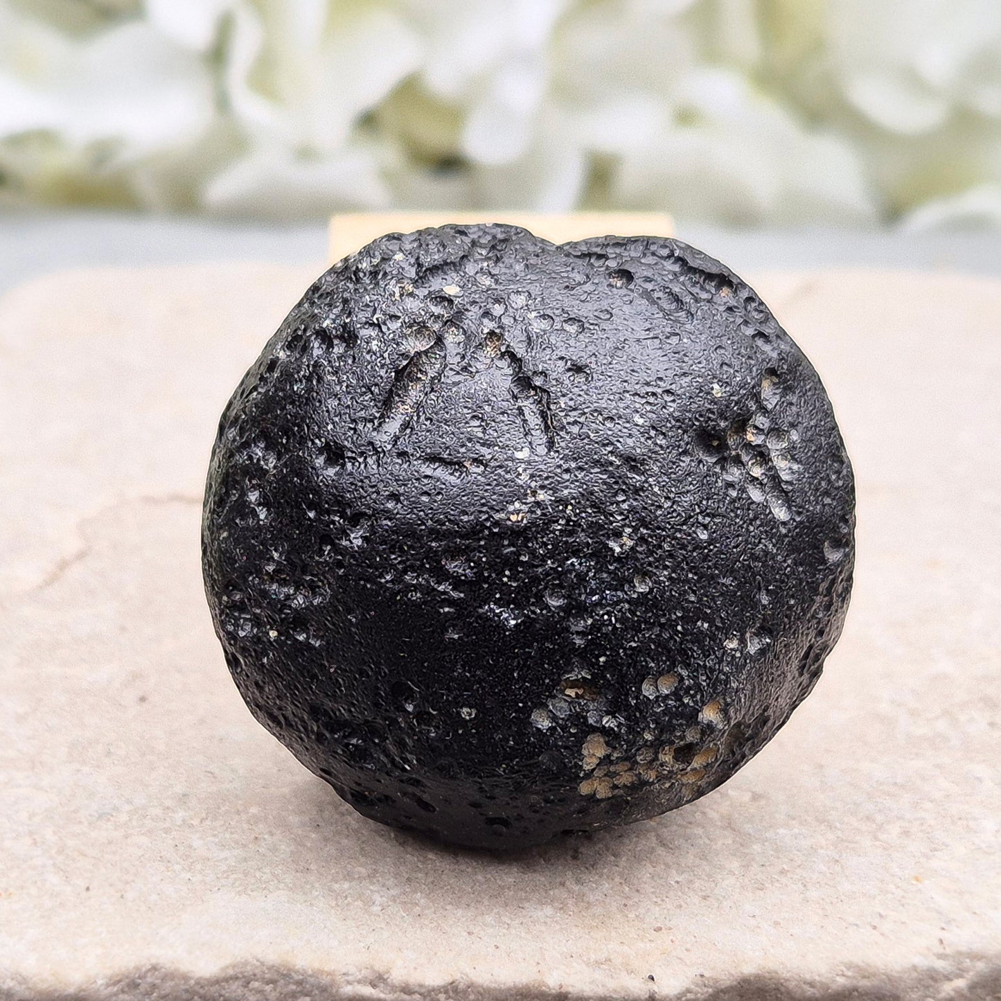 Genuine Black Tektite for grounding and energetic protection. Formed from ancient meteorite impacts. Ideal for meditation and aura clearing.