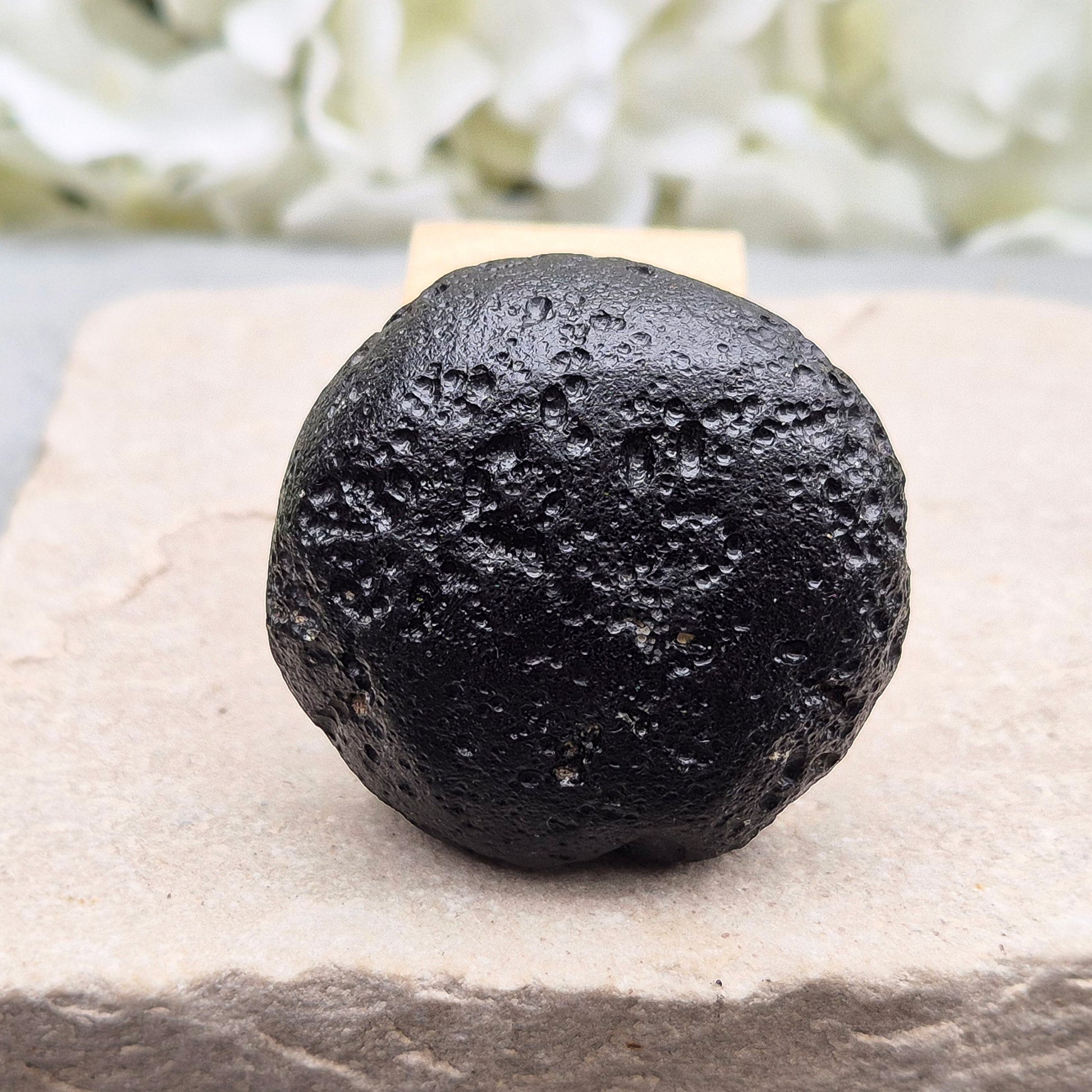 Genuine Black Tektite for grounding and energetic protection. Formed from ancient meteorite impacts. Ideal for meditation and aura clearing.