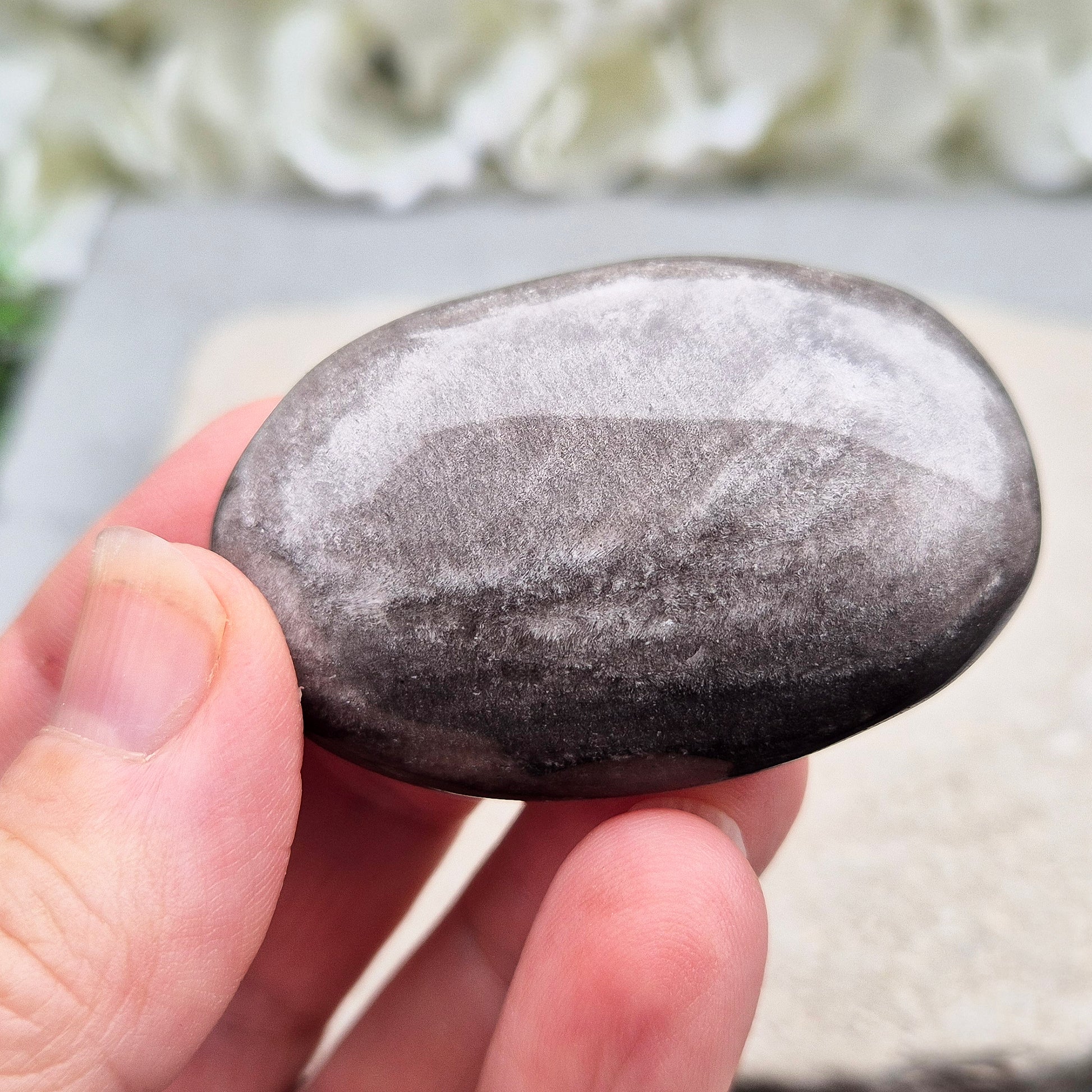 Grounding and protective Silver Sheen Obsidian crystal that enhances self-awareness, inner strength, and emotional balance.