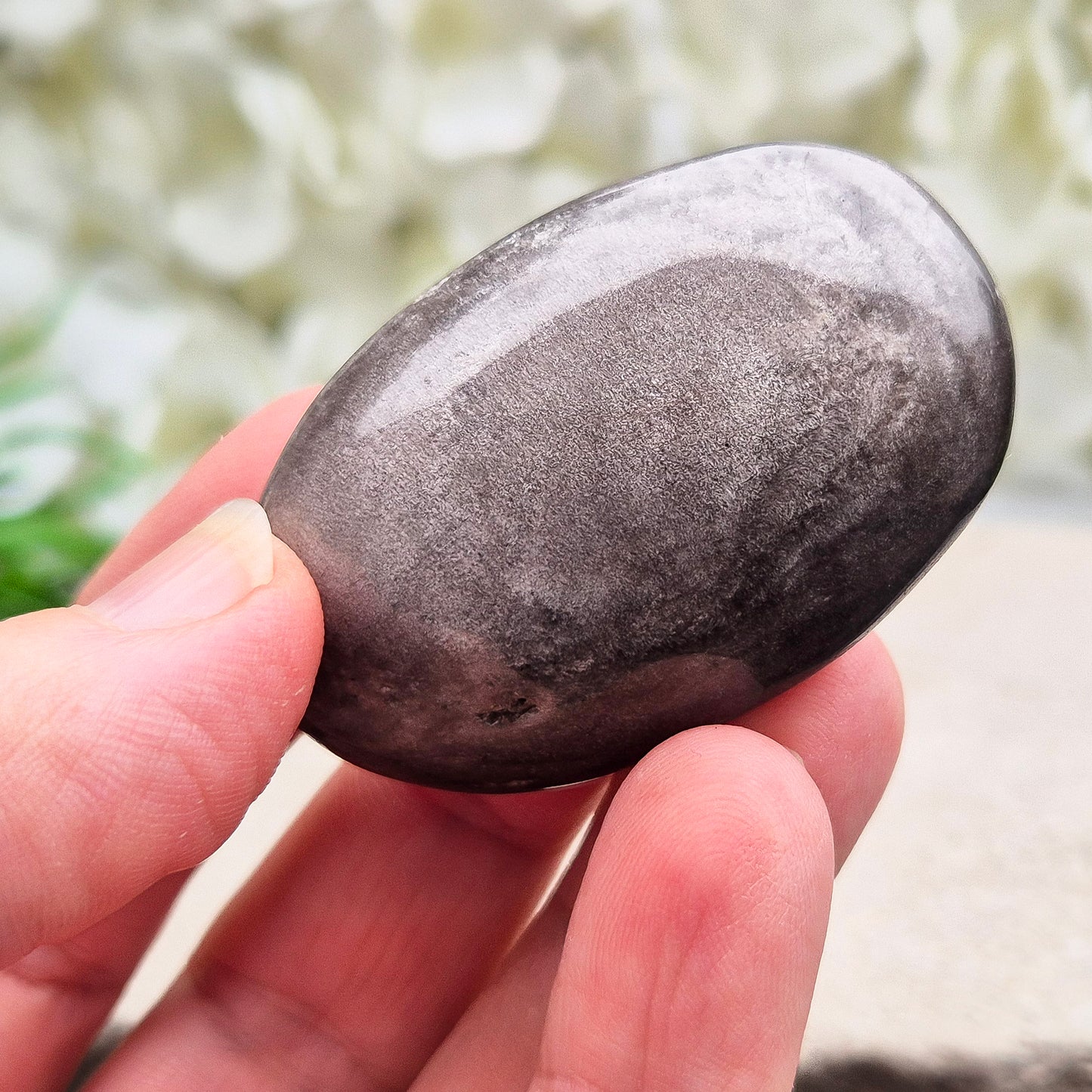 Grounding and protective Silver Sheen Obsidian crystal that enhances self-awareness, inner strength, and emotional balance.