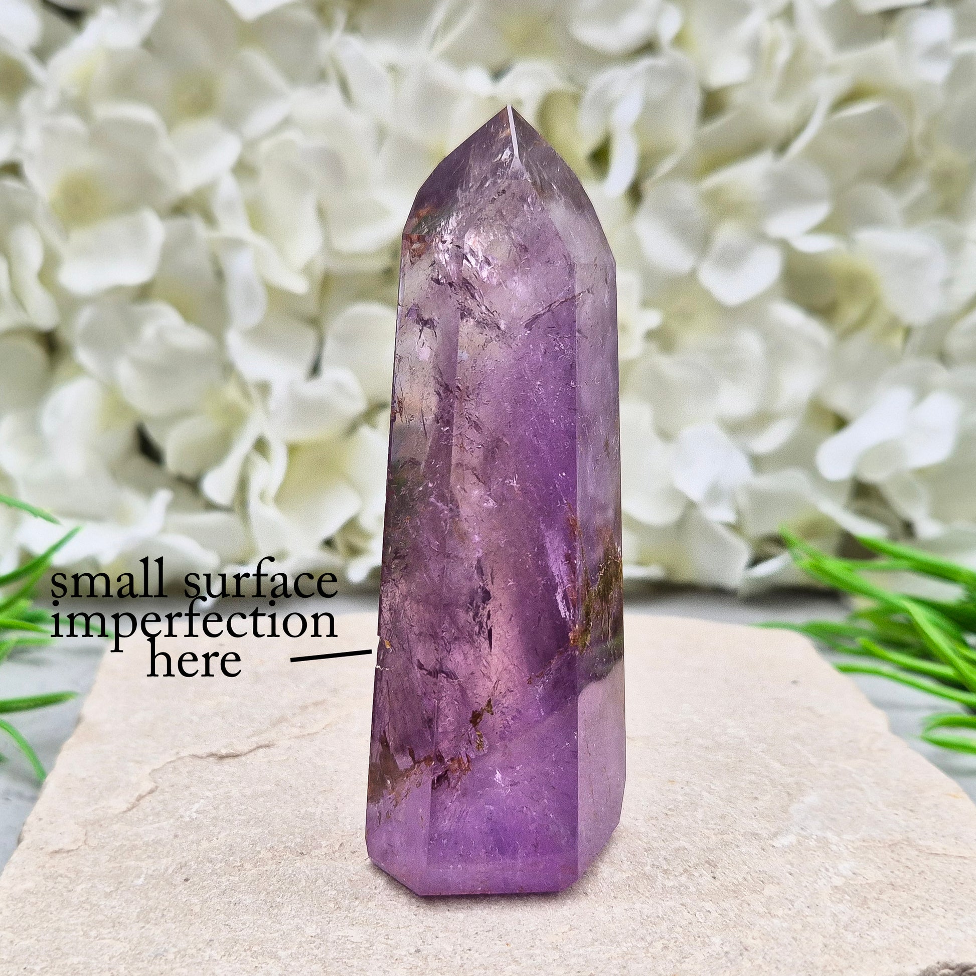 Amethyst Tower with Iron Ore Inclusions – calming, protective energy for peace and balance. Ideal for meditation, home harmony, and emotional support.