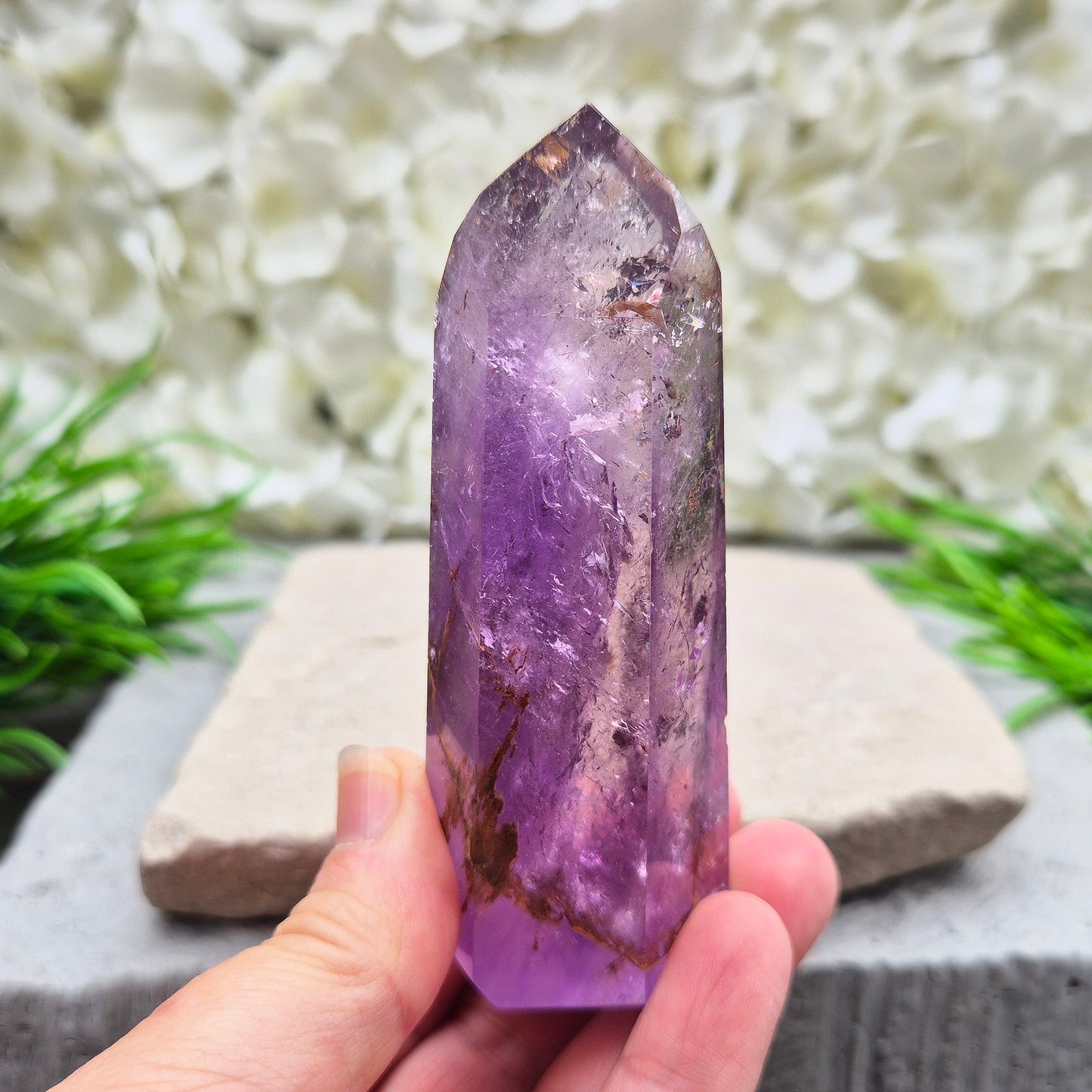 Amethyst Tower with Iron Ore Inclusions – calming, protective energy for peace and balance. Ideal for meditation, home harmony, and emotional support.