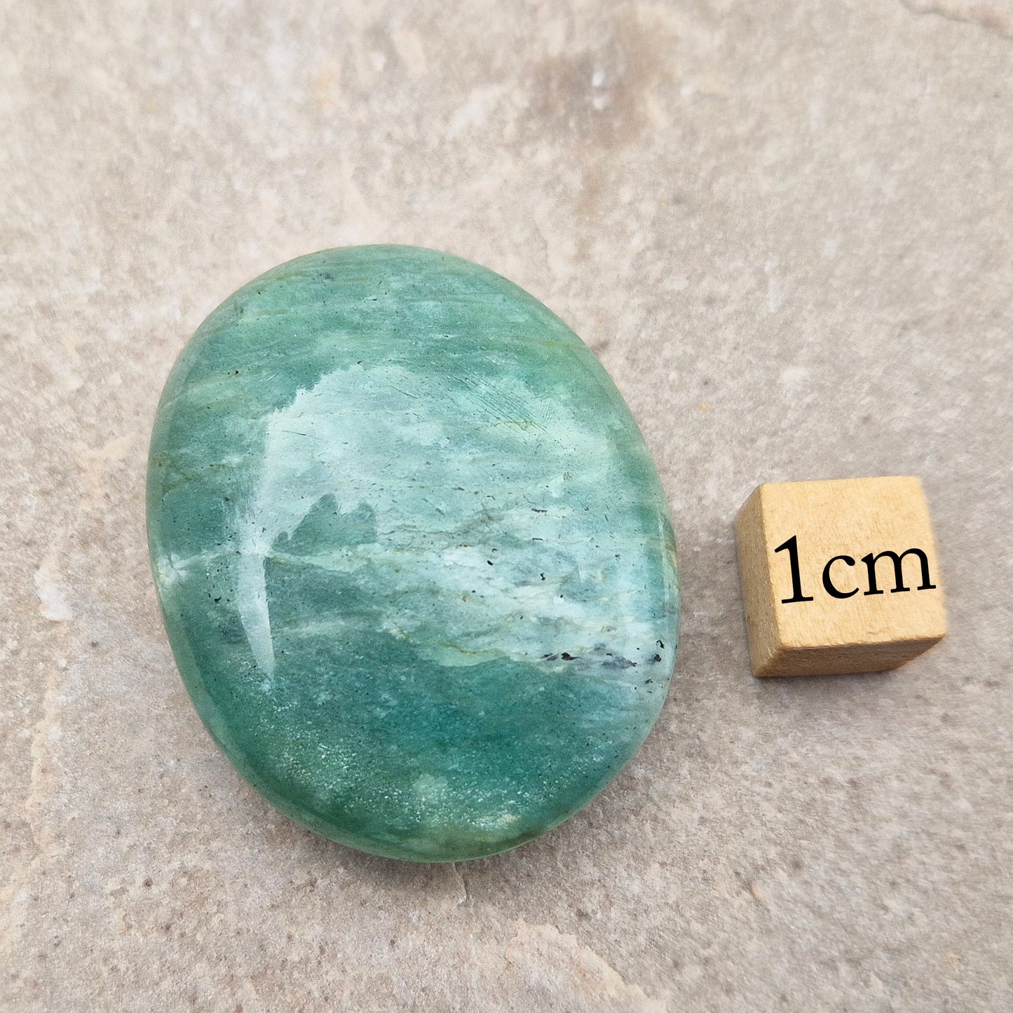 Soothing Amazonite galet to support calm, confidence, and honest expression. A gentle crystal for emotional balance and everyday support.