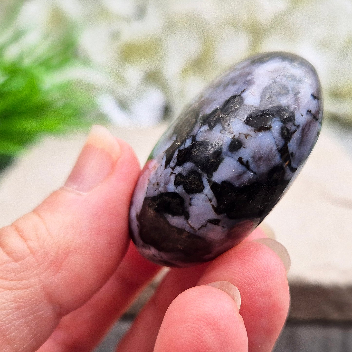 Indigo Gabbro palm stone for grounding, balancing energy, and supporting emotional awareness. Smooth, polished, perfect for meditation or holding.