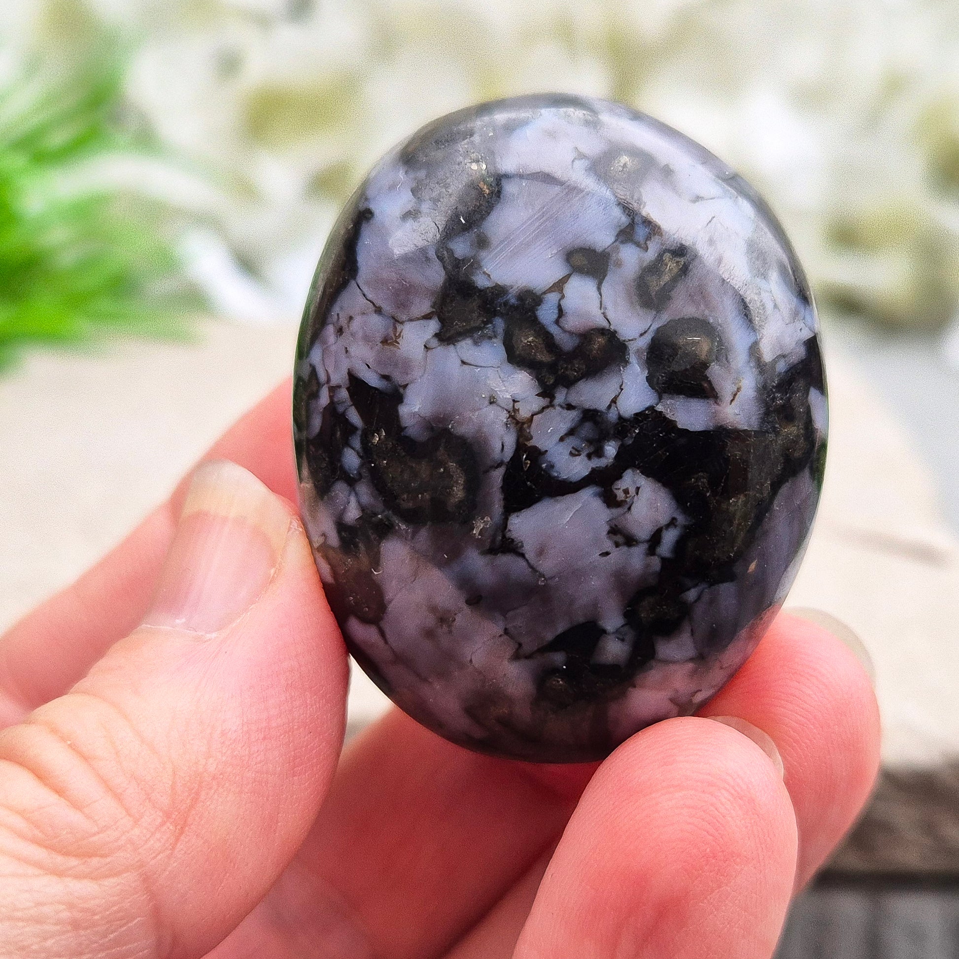 Indigo Gabbro palm stone for grounding, balancing energy, and supporting emotional awareness. Smooth, polished, perfect for meditation or holding.